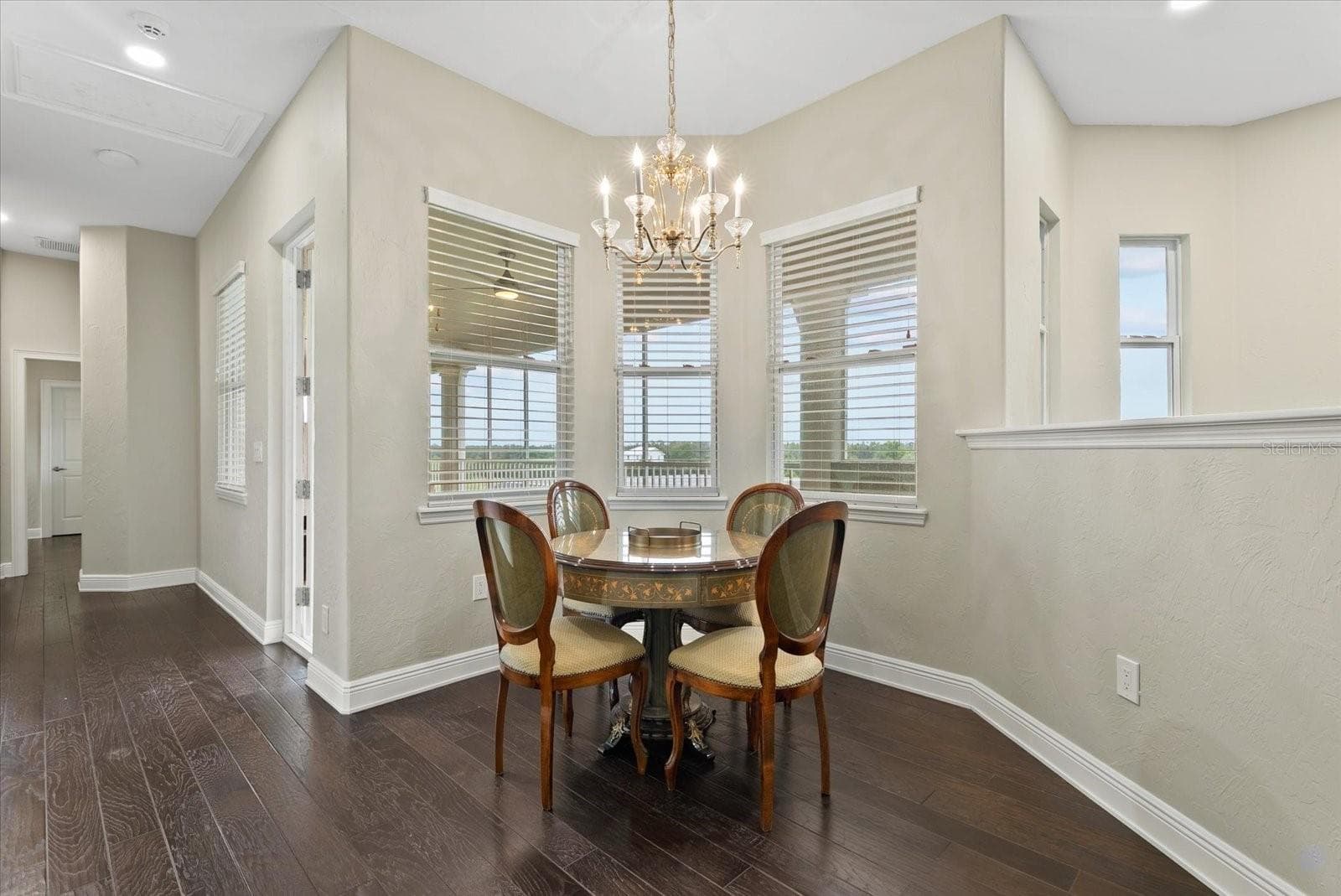 At the top of the stairs is a small nook which can be a great game room or tv nook - 520 RYE RD NE, BRADENTON