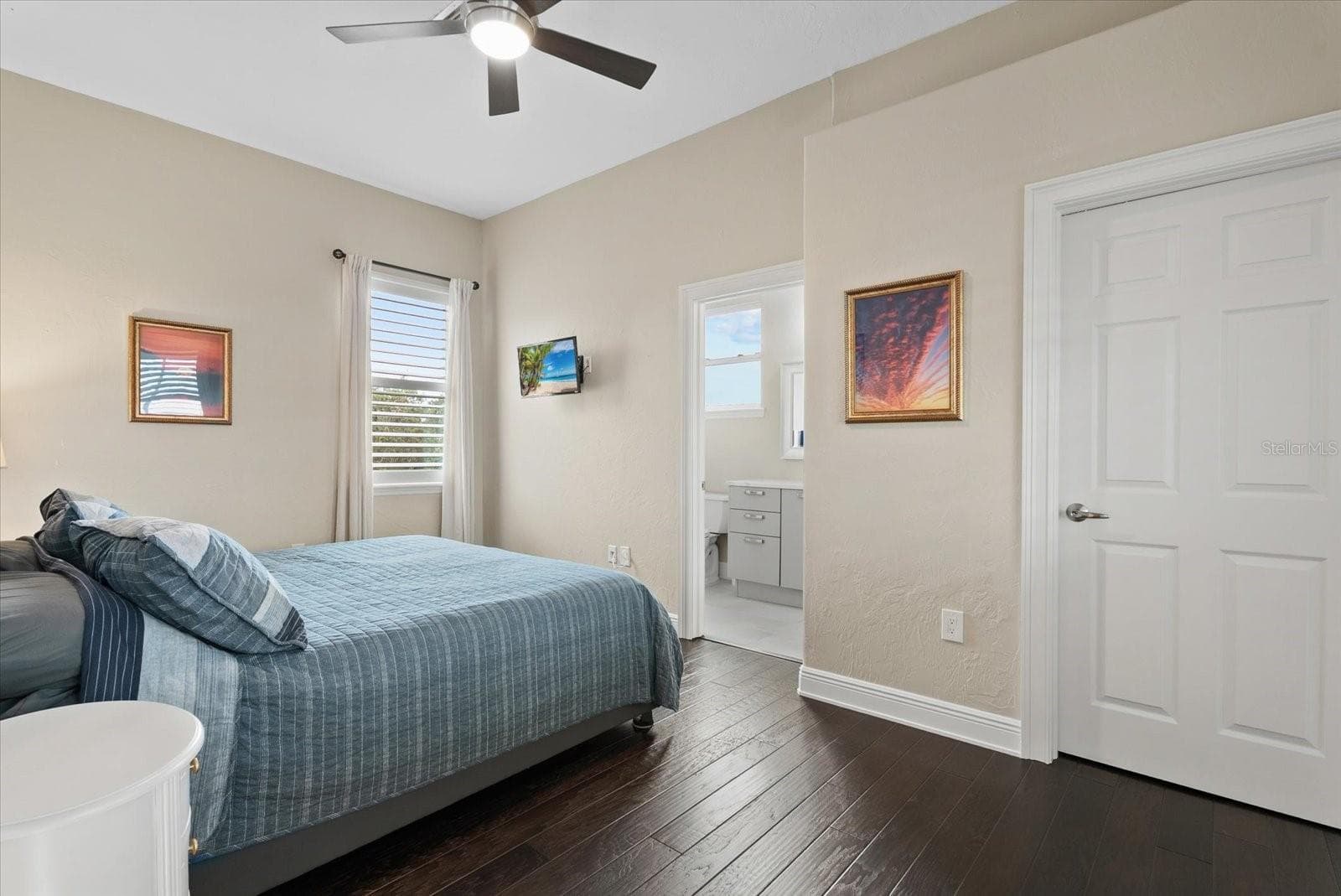 Bedroom five is also upstairs, with a walk-in closet and private ensuite bath - 520 RYE RD NE, BRADENTON