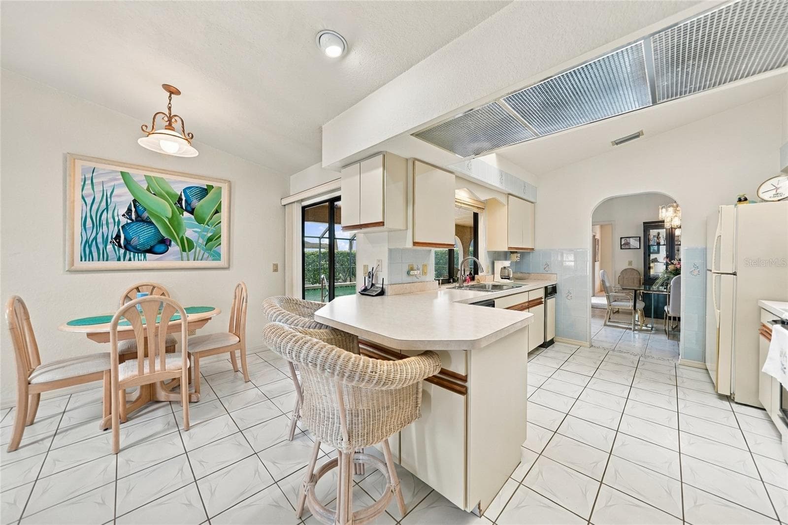 Kitchen with breakfast bar - 5242 FORBES TER, PORT CHARLOTTE