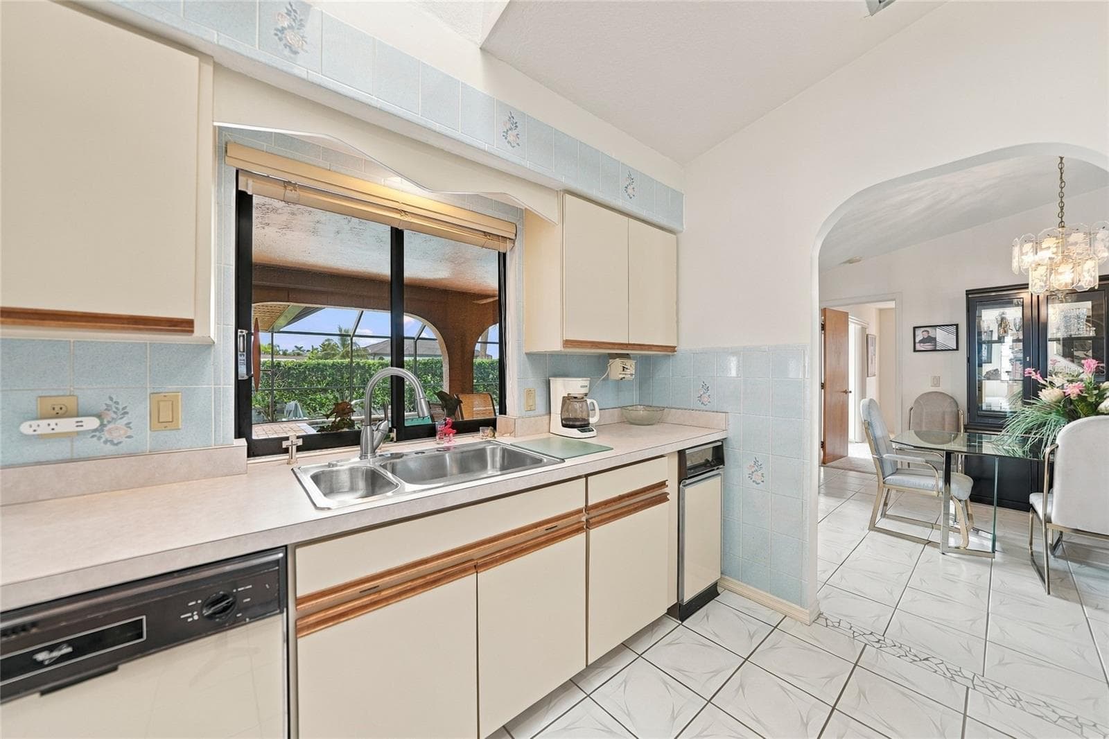 Kitchen with water and pool views - 5242 FORBES TER, PORT CHARLOTTE