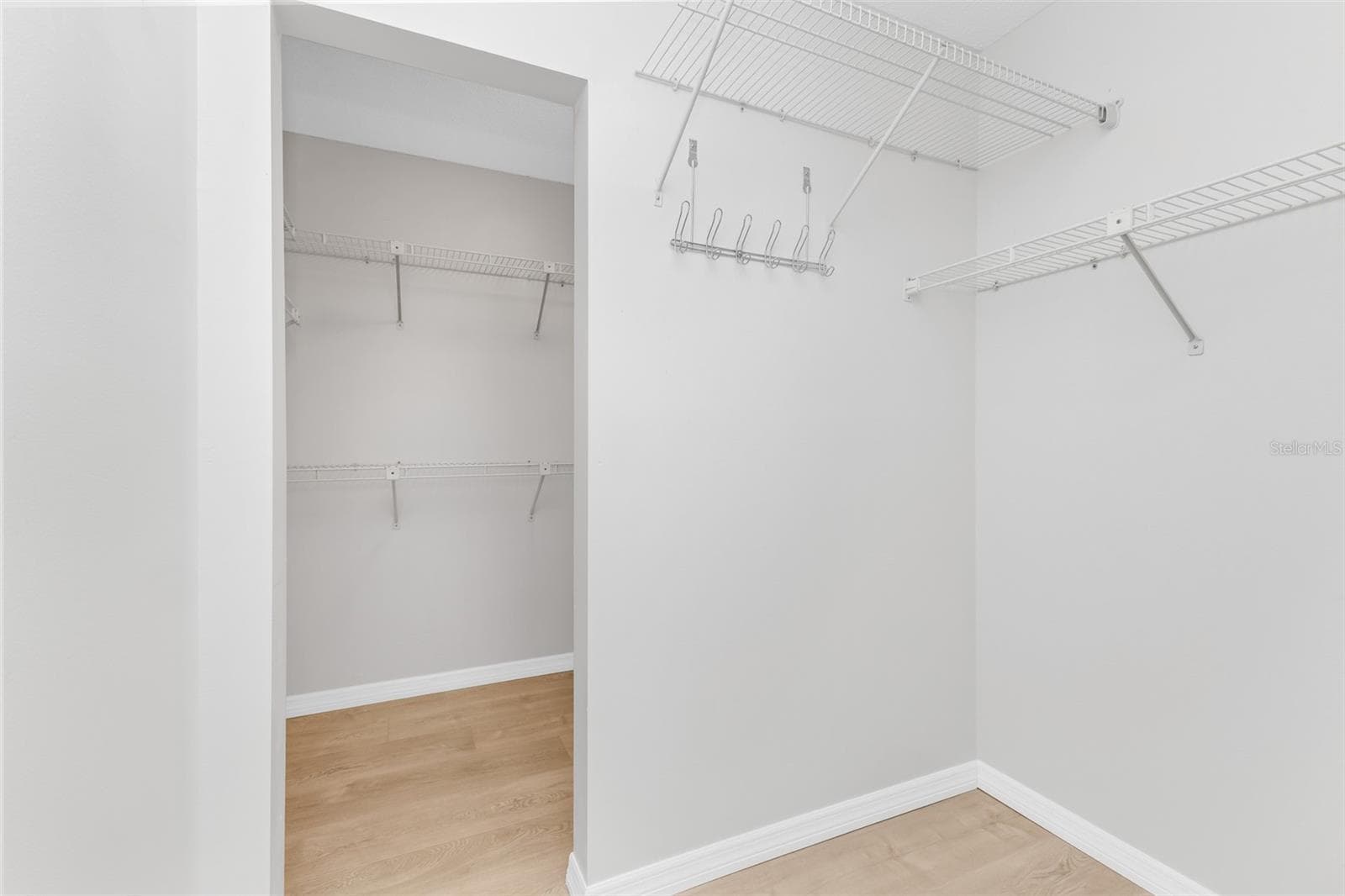 Large primary walk-in closet. - 1311 TUSCANY DR, PUNTA GORDA