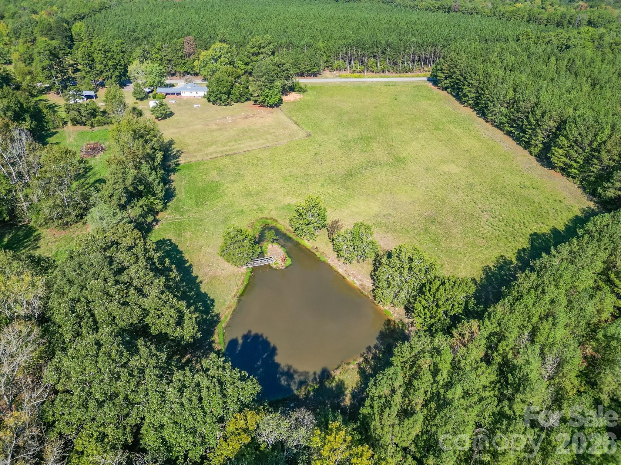 Beautiful open pasture with large pond - 7615 S Rocky River Road, Monroe