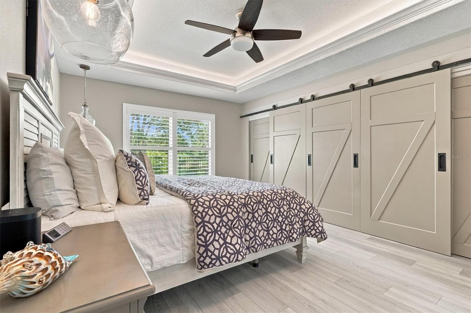 PRIMARY BEDROOM WITH CUSTOM DOORS - 6791 SW 179TH COURT RD, DUNNELLON