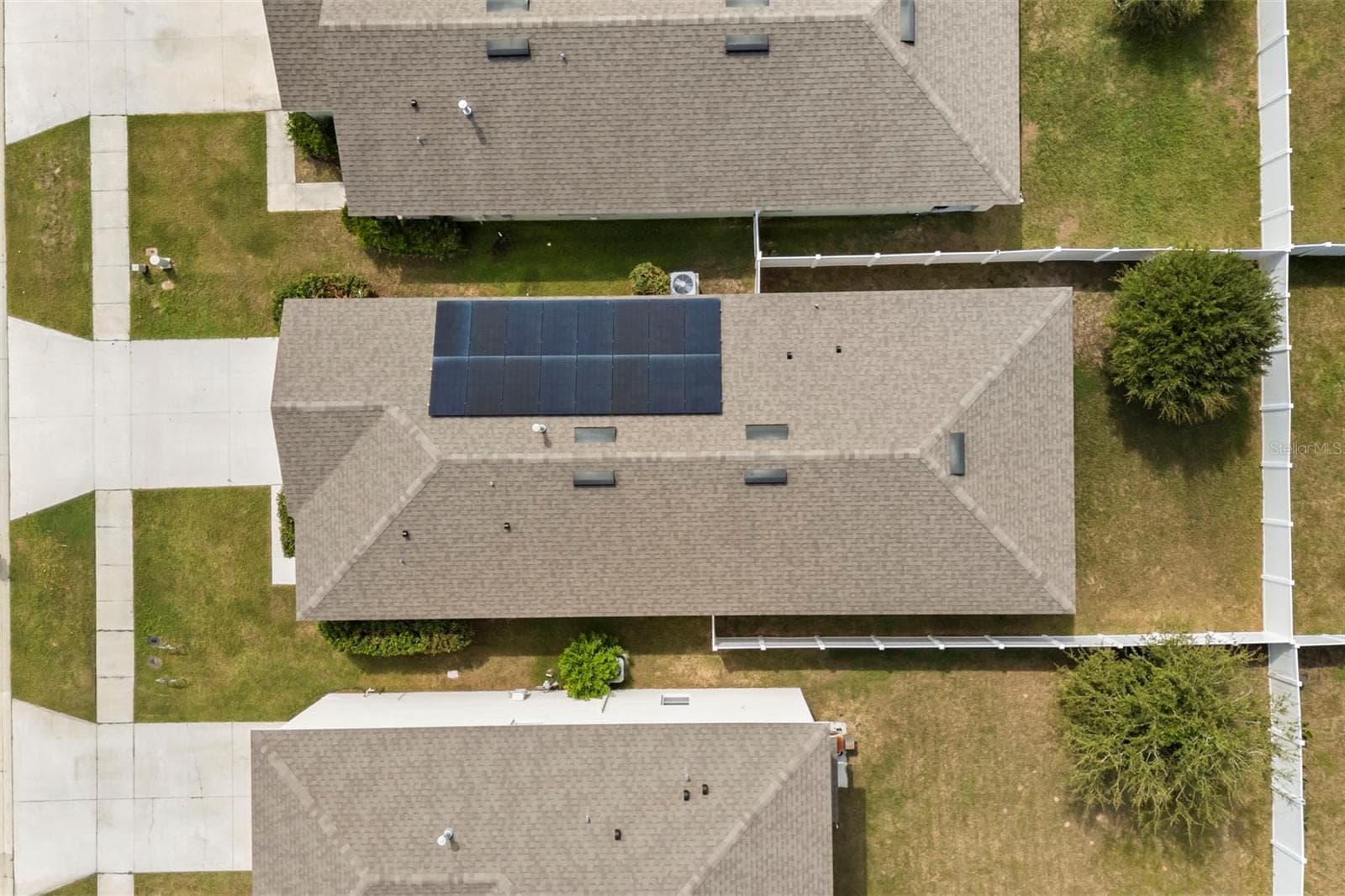 Overhead view showcasing the home’s solar panels and roofline. - 3658 CASPIAN ST, LEESBURG