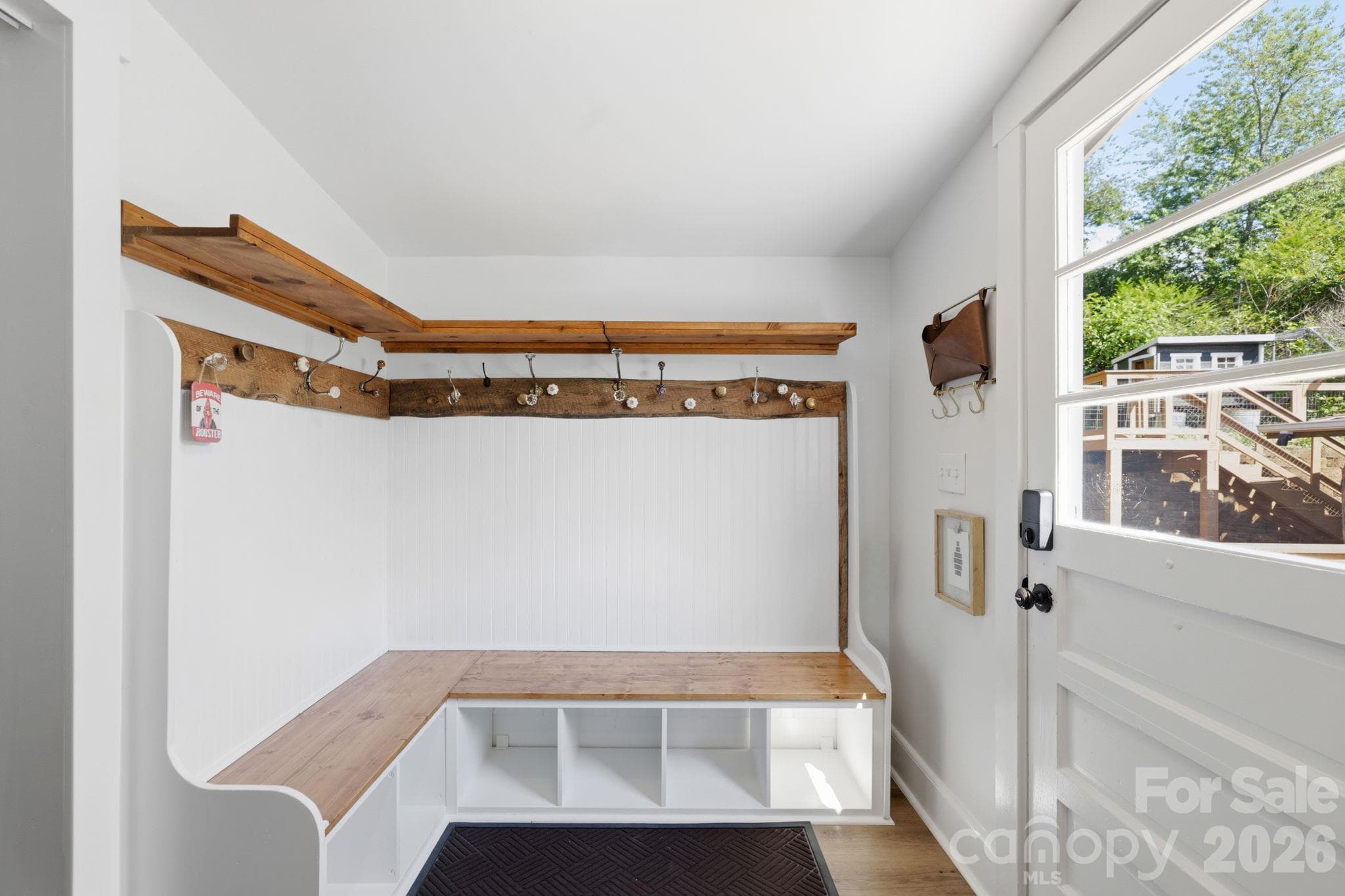 Convenient coat and shoe storage off back porch - 2252 Riceville Road, Asheville