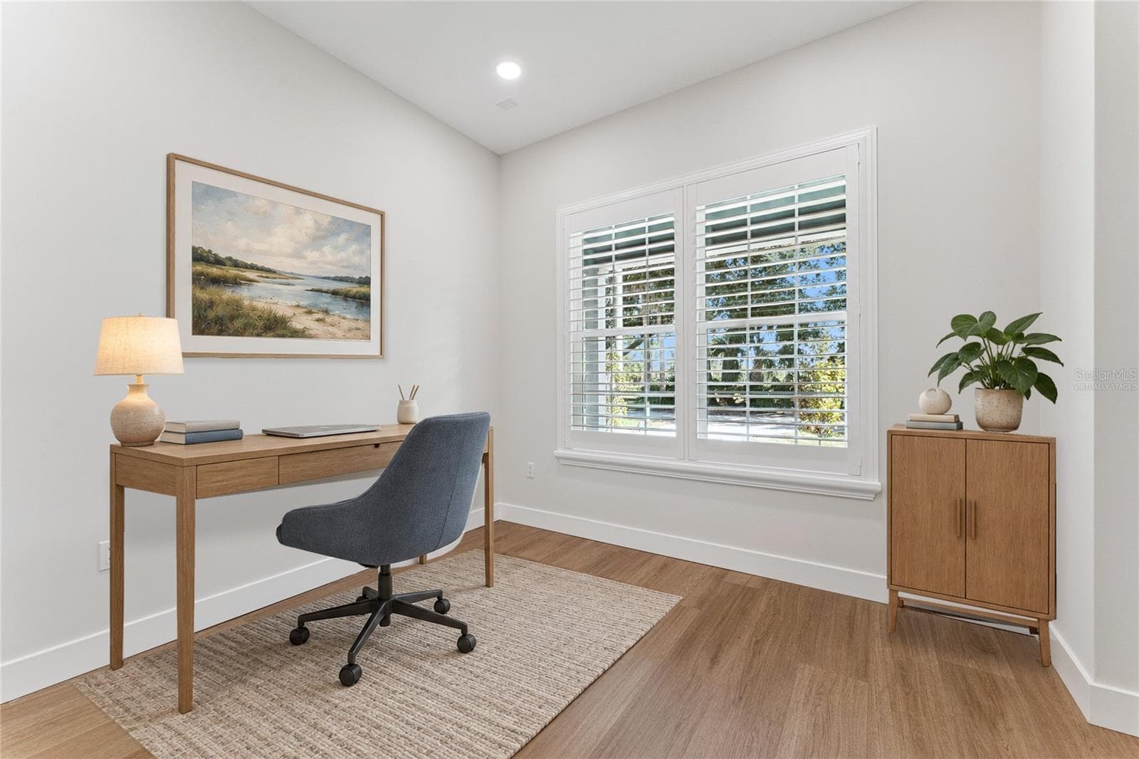 Virtually Staged - Paired shuttered windows bring natural light into this first floor office. - 3456 FAIRWAY LN, ORLANDO