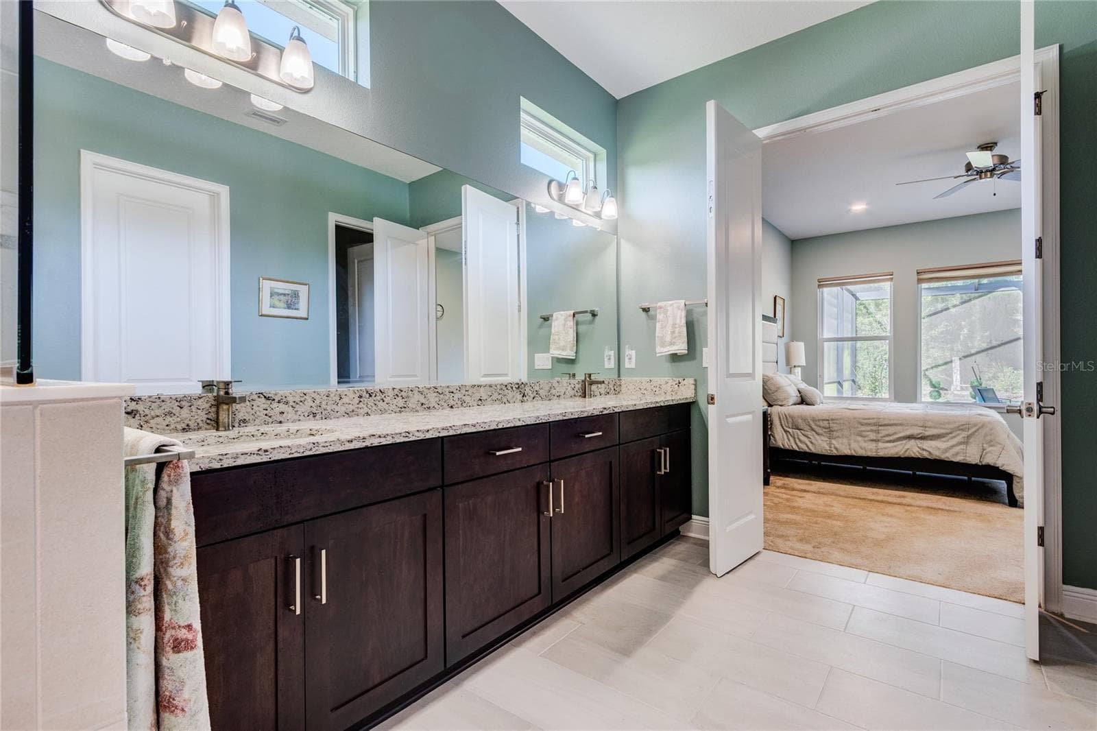 Luxurious bath ensuite with dual sinks , tub and large shower - 13303 TRAILING MOSS DR, DADE CITY