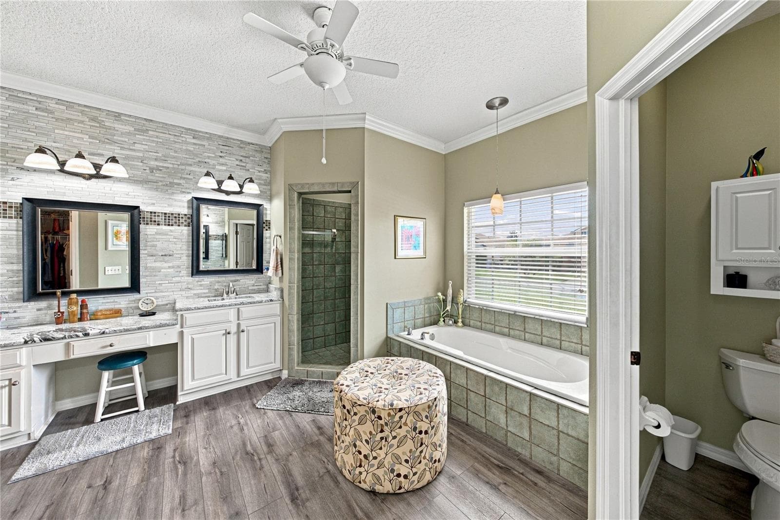 The primary bath is quite large, and the recent remodel is a major upgrade. - 4232 DORNOCH DR, LAKE WALES