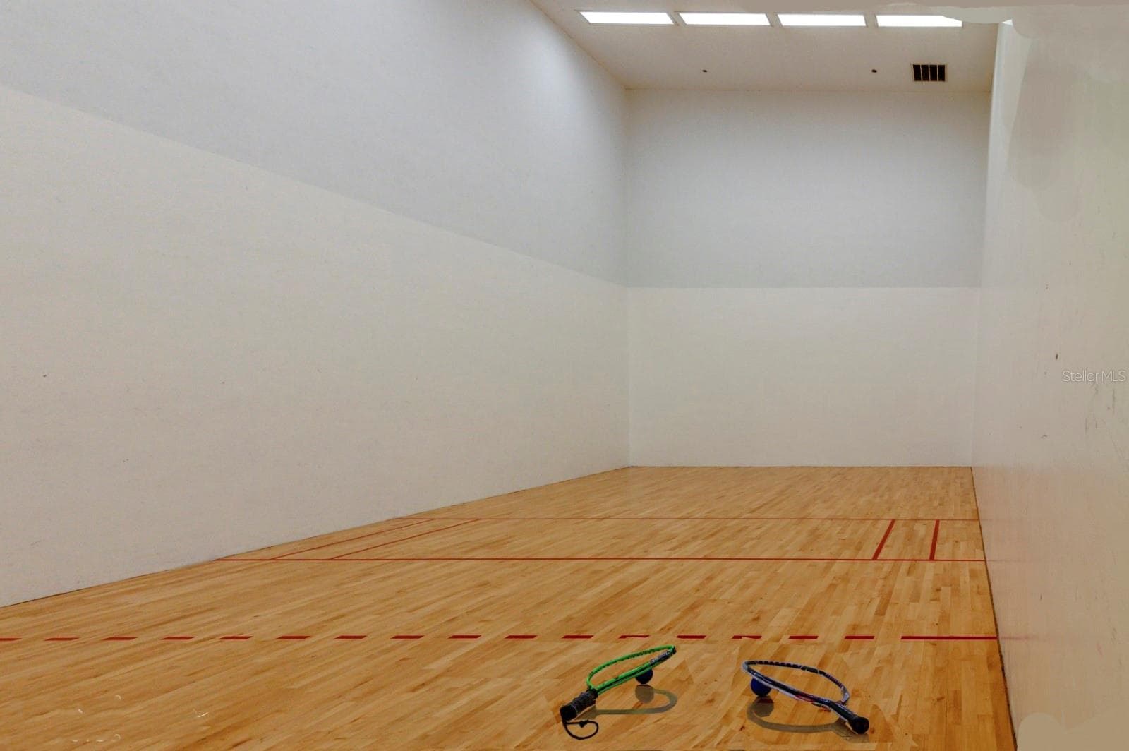 The Health and Fitness Center racquetball court. - 4232 DORNOCH DR, LAKE WALES