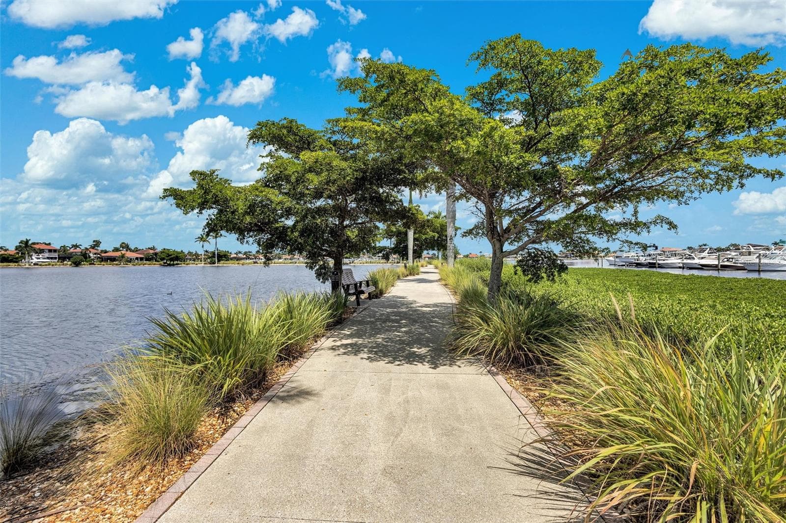 Walkway behind building - 140 RIVIERA DUNES WAY #306, PALMETTO