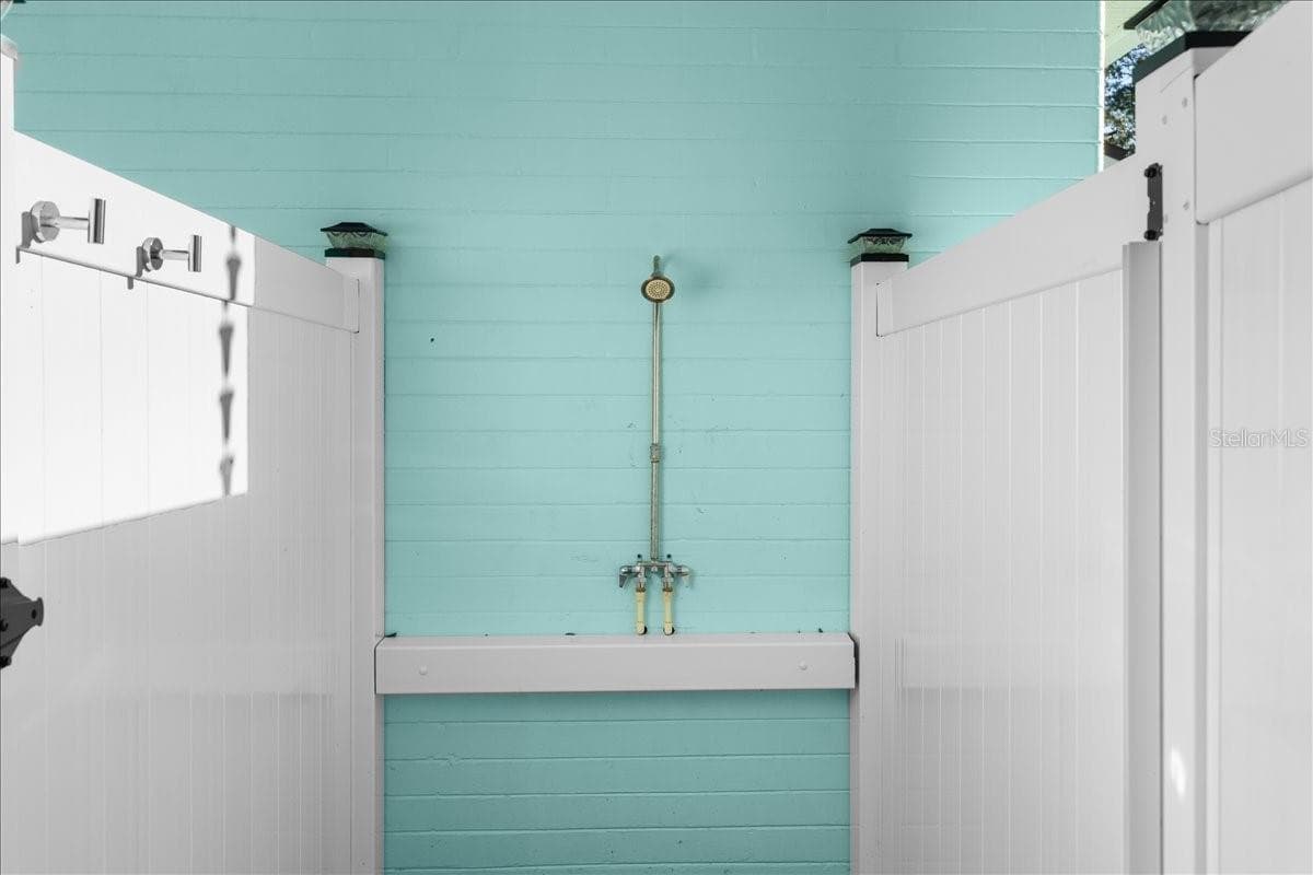 Outdoor shower after a beach day - 1146 RIVERSIDE DR, DAYTONA BEACH
