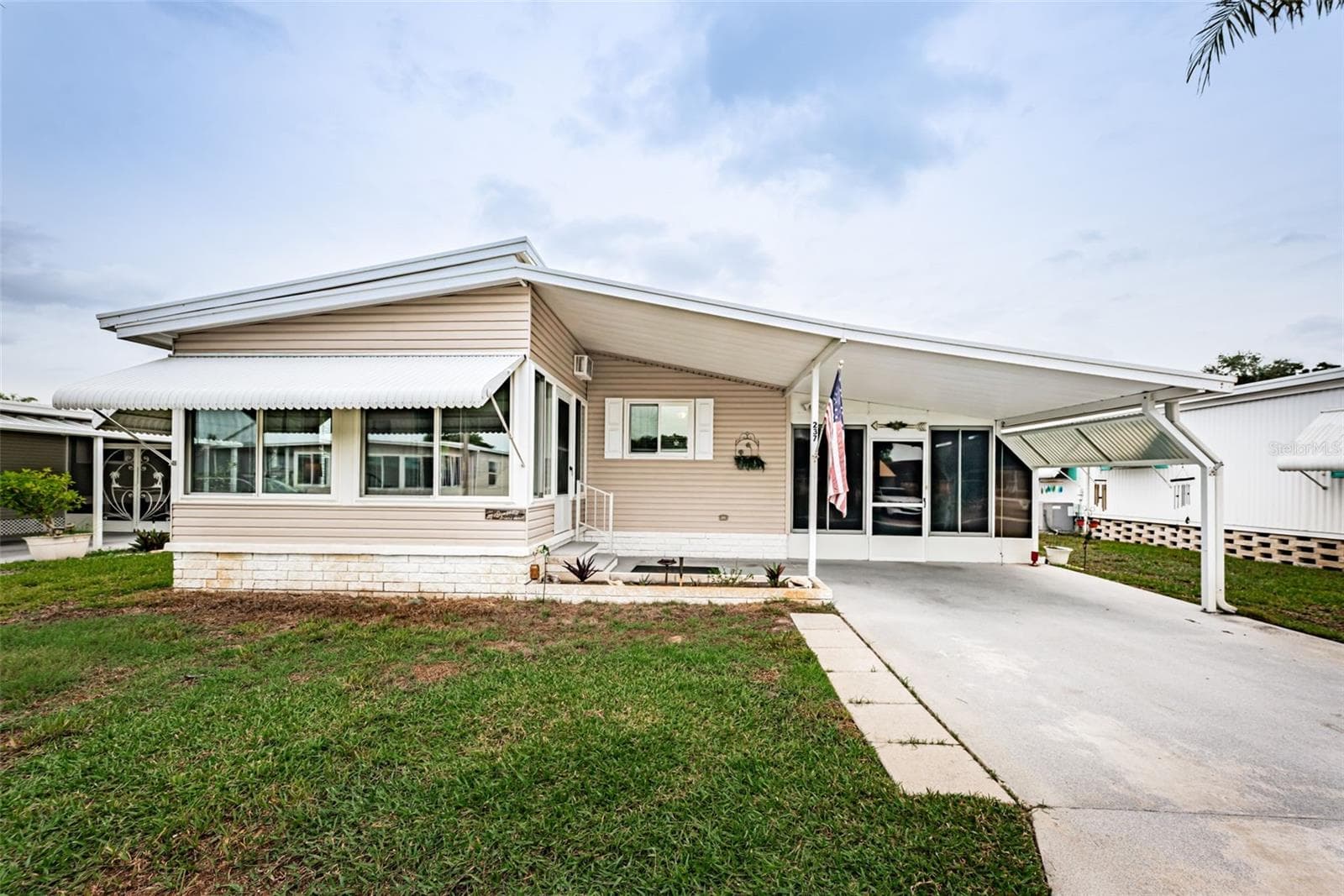 Manufactured Home at 39820 US HIGHWAY 19 N #237, TARPON SPRINGS, photo 2 of 68