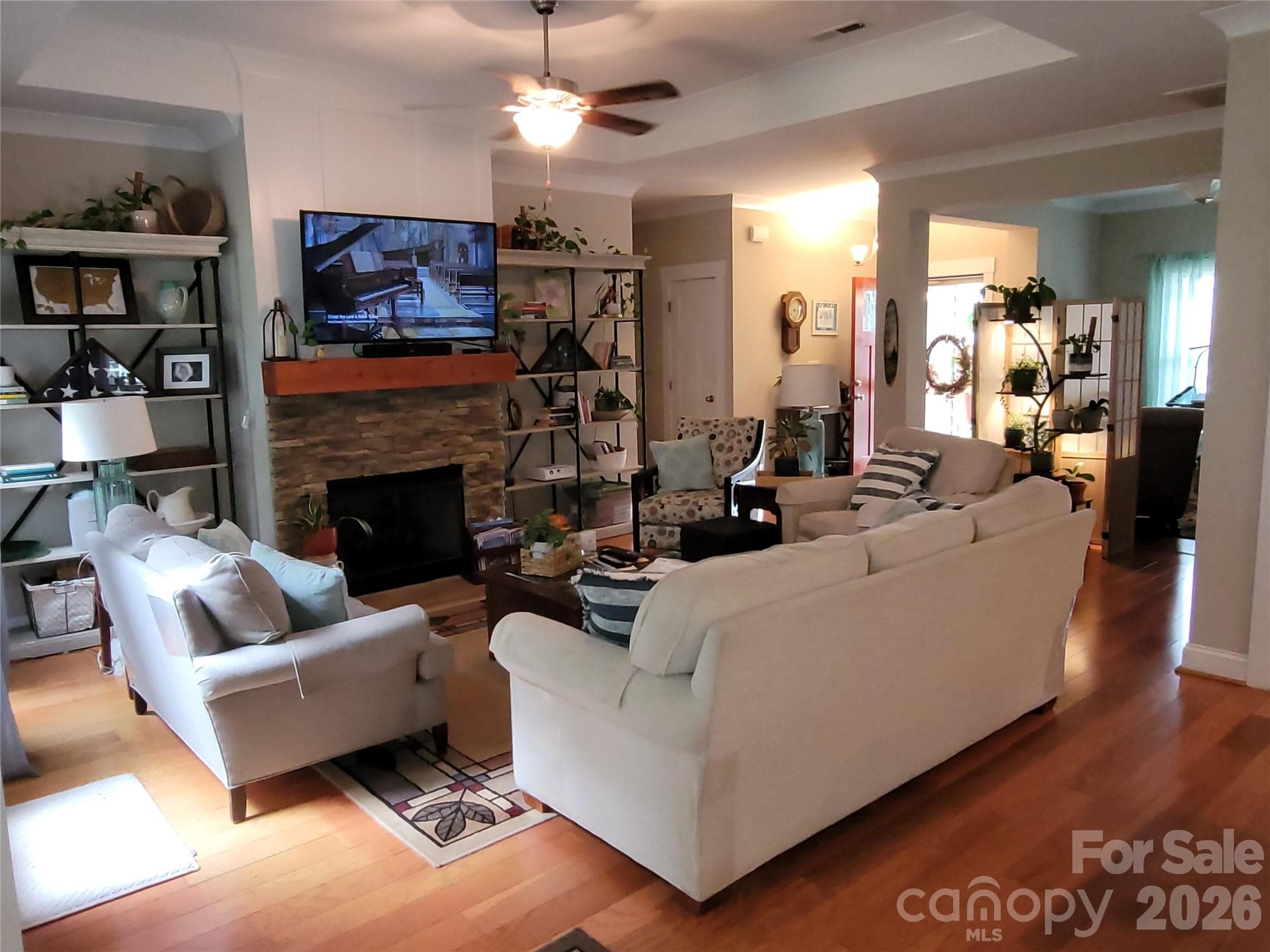 Great Room with Prefinished Hardwood Floors and Tray Ceilings - 2117 London Lane, Belmont
