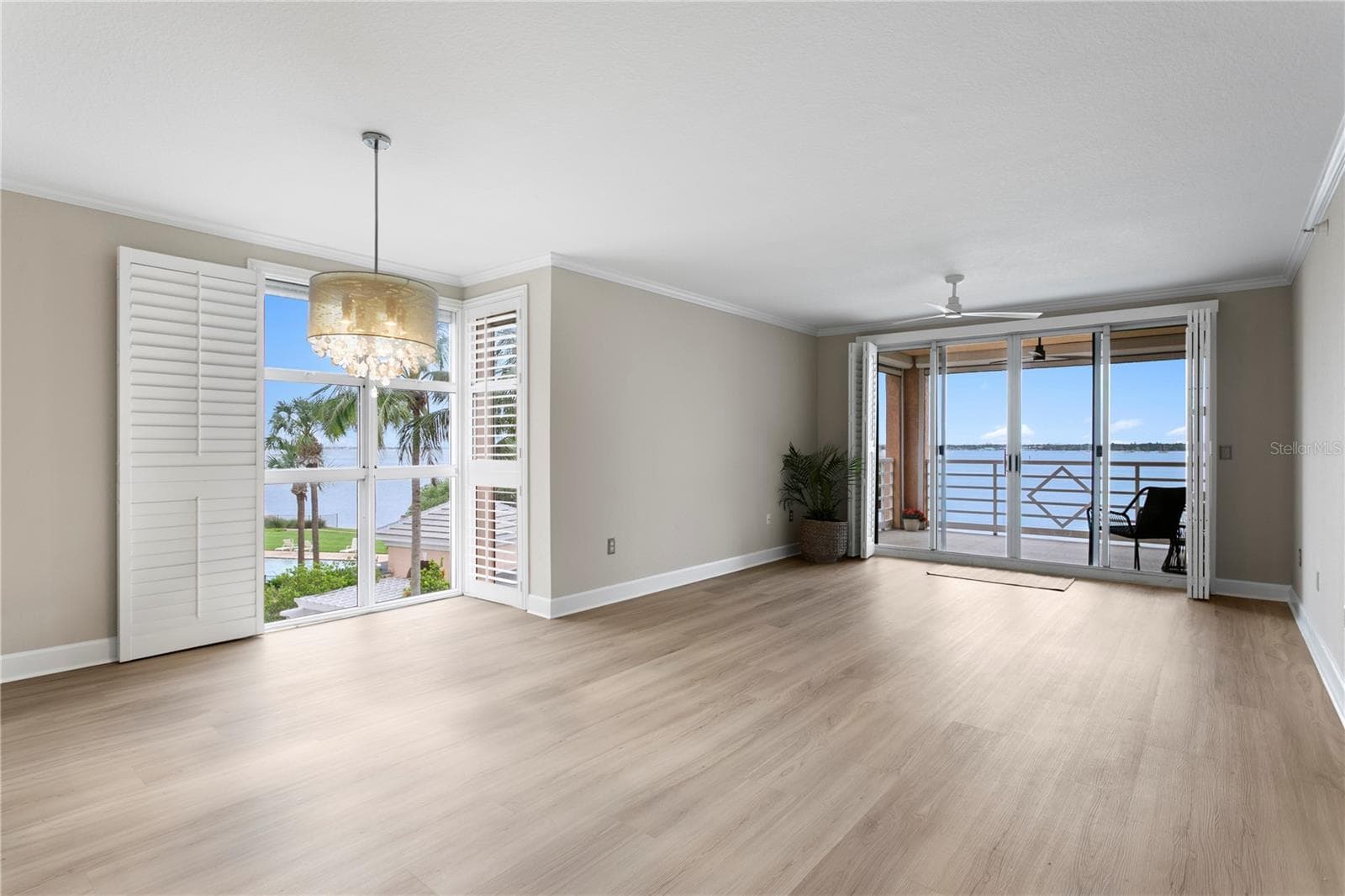 Open Dining and Living Area with Boca Ciera Water Views - 4961 BACOPA LN S #201, ST PETERSBURG