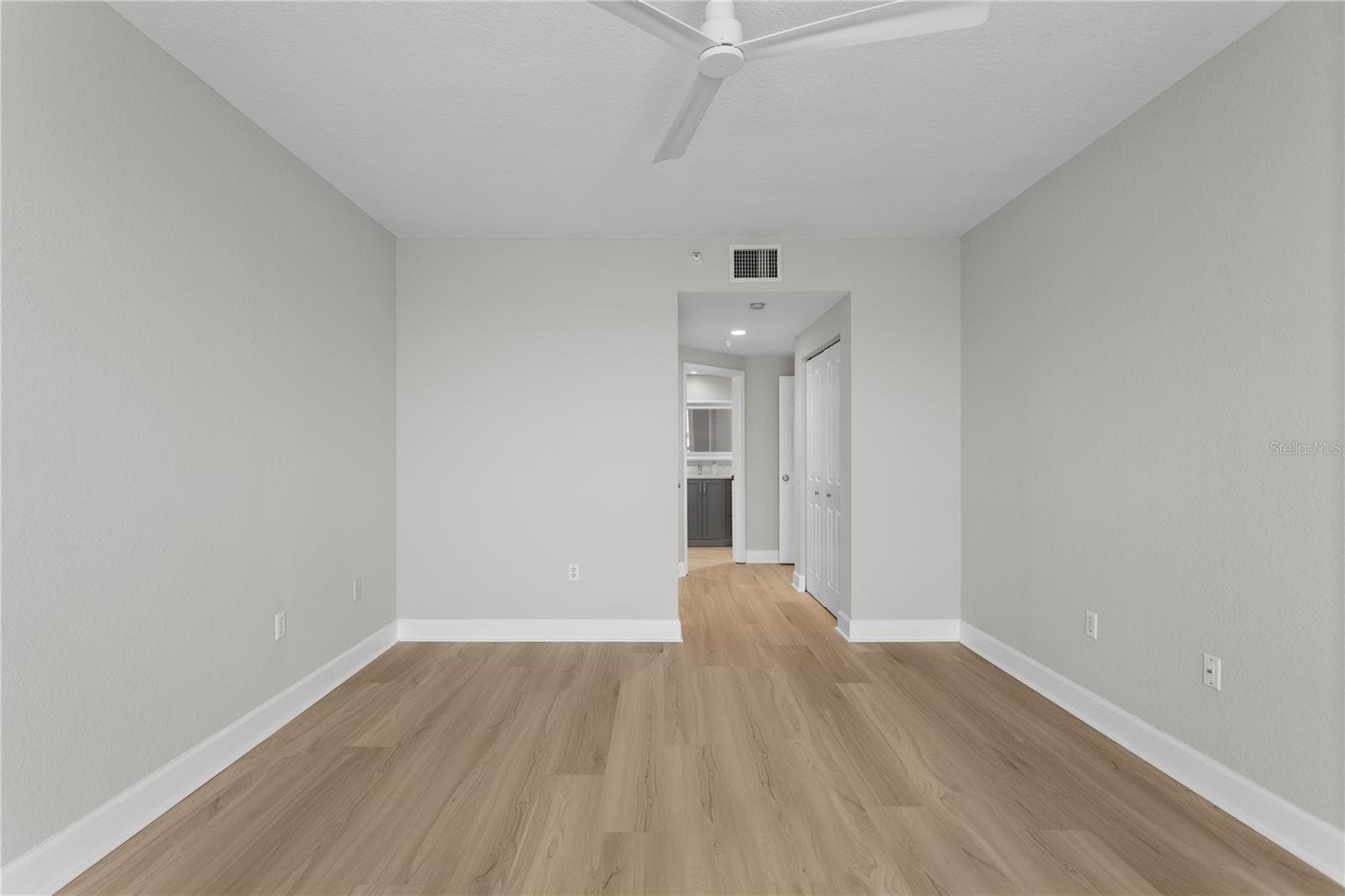 Primary looking back to Closets and Bathroom - 4961 BACOPA LN S #201, ST PETERSBURG