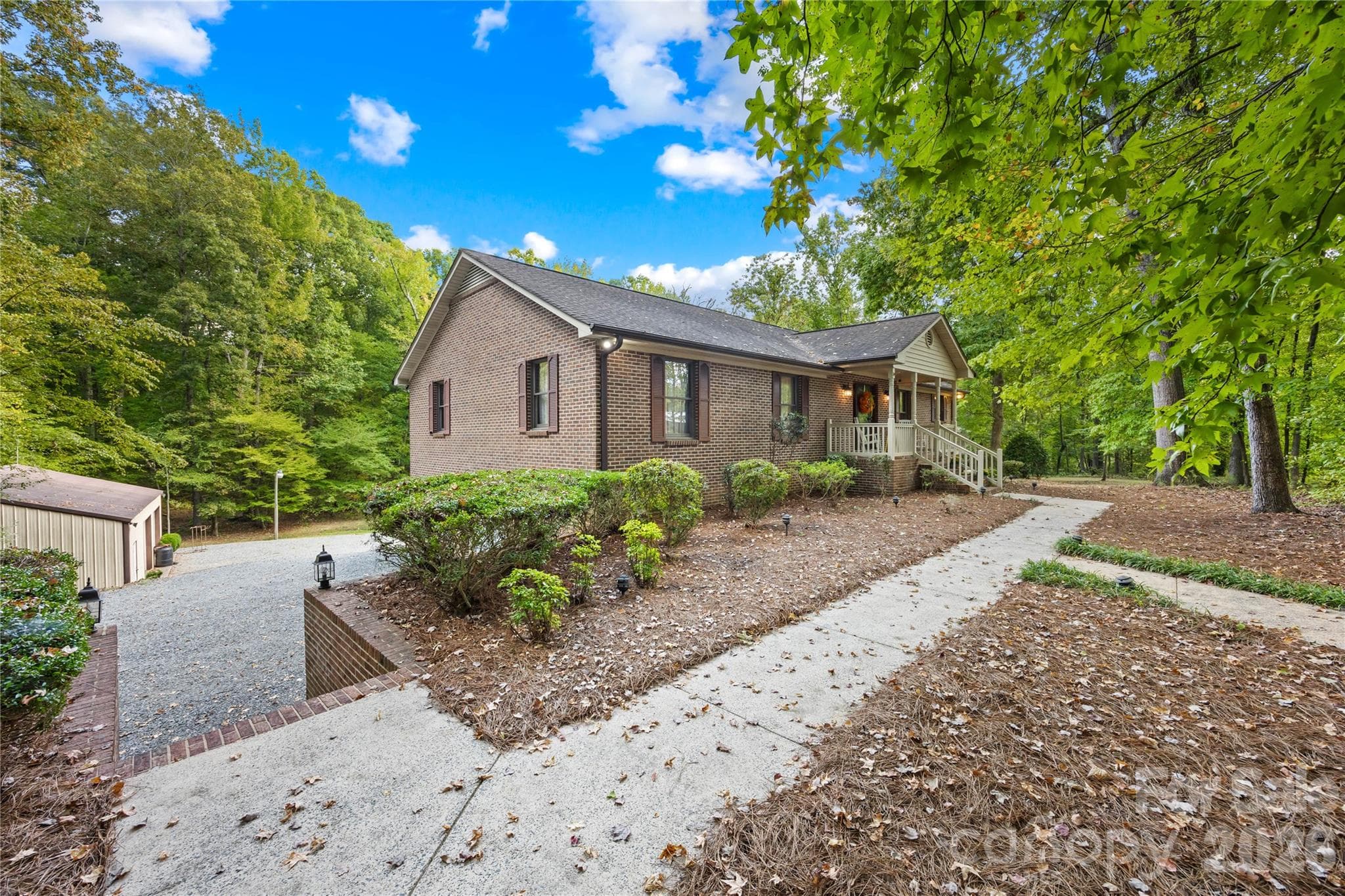sidewalk to front door and garage - 16208 Deepwood Place, Indian Trail