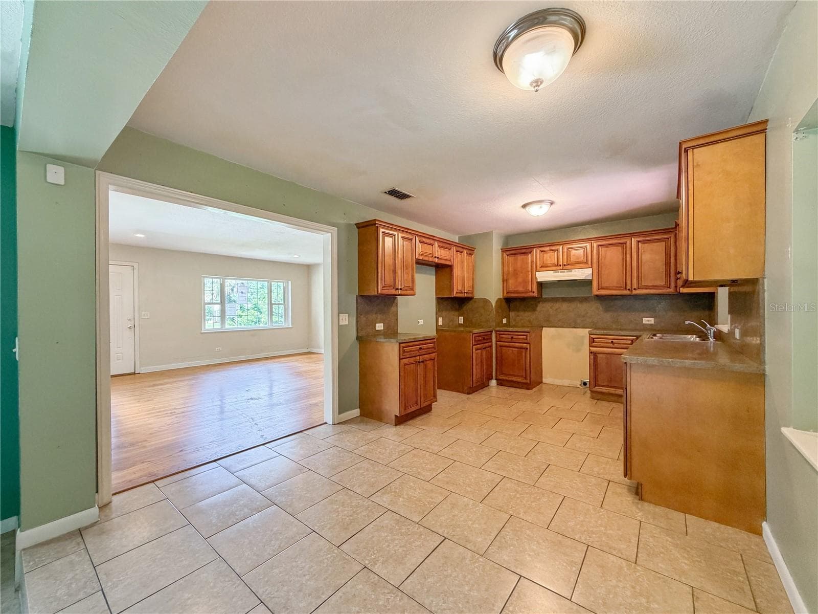 Kitchen & Dining Area - 709 NW PALM DR, LAKE CITY