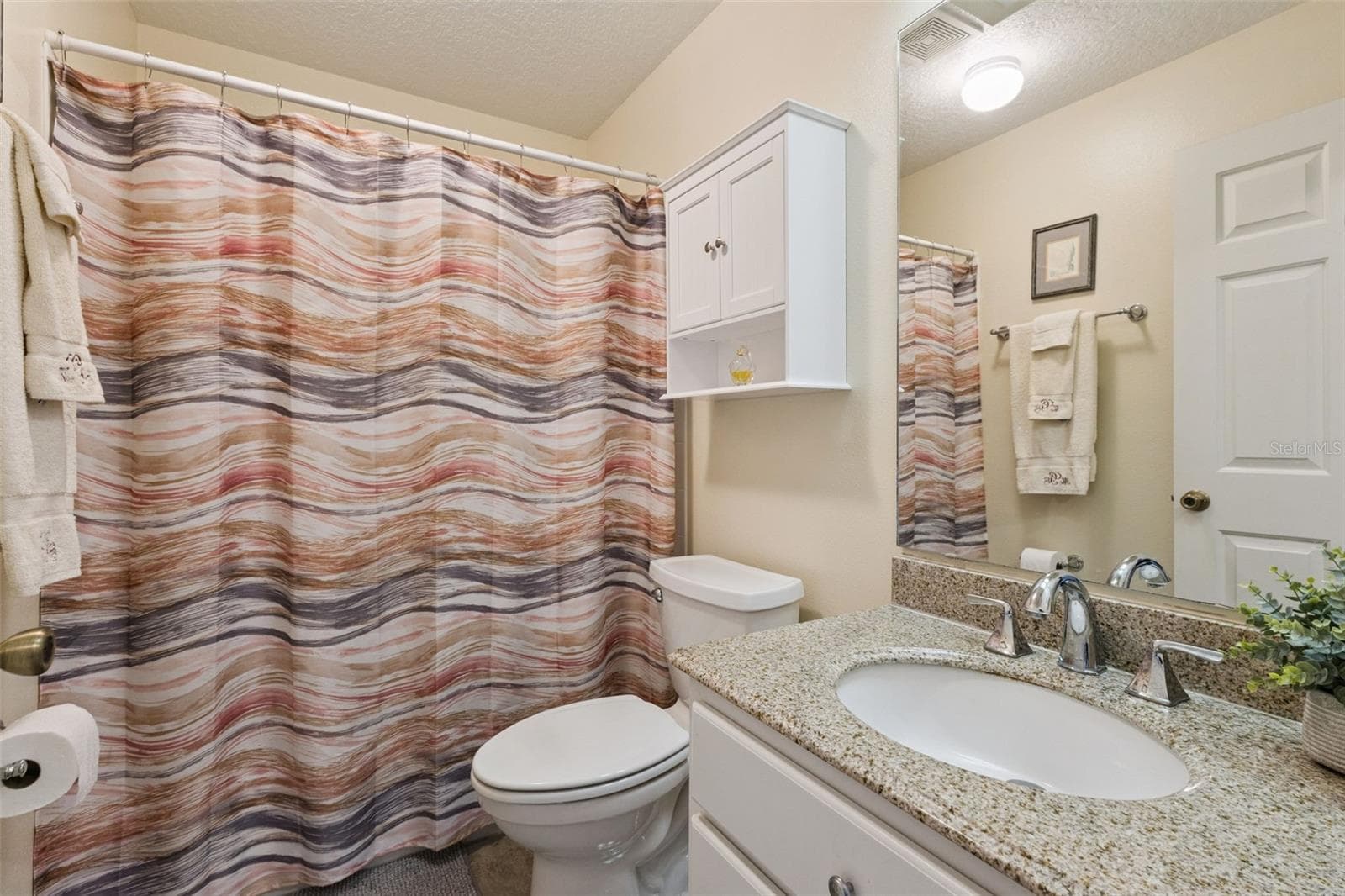 BATHROOM 2 has SOLID-SURFACE COUNTER, TUB/SHOWER COMBO and a WINDOW. - 21736 PRINCESS GRACE CT, LEESBURG