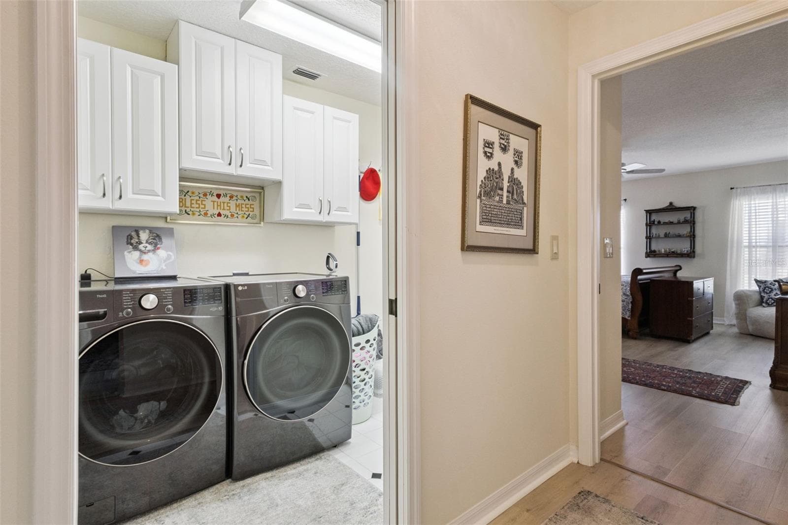 SPACIOUS LAUNDRY ROOM IS NEXT TO PRIMARY SUITE. Washer & Dryer do NOT convey. - 21736 PRINCESS GRACE CT, LEESBURG