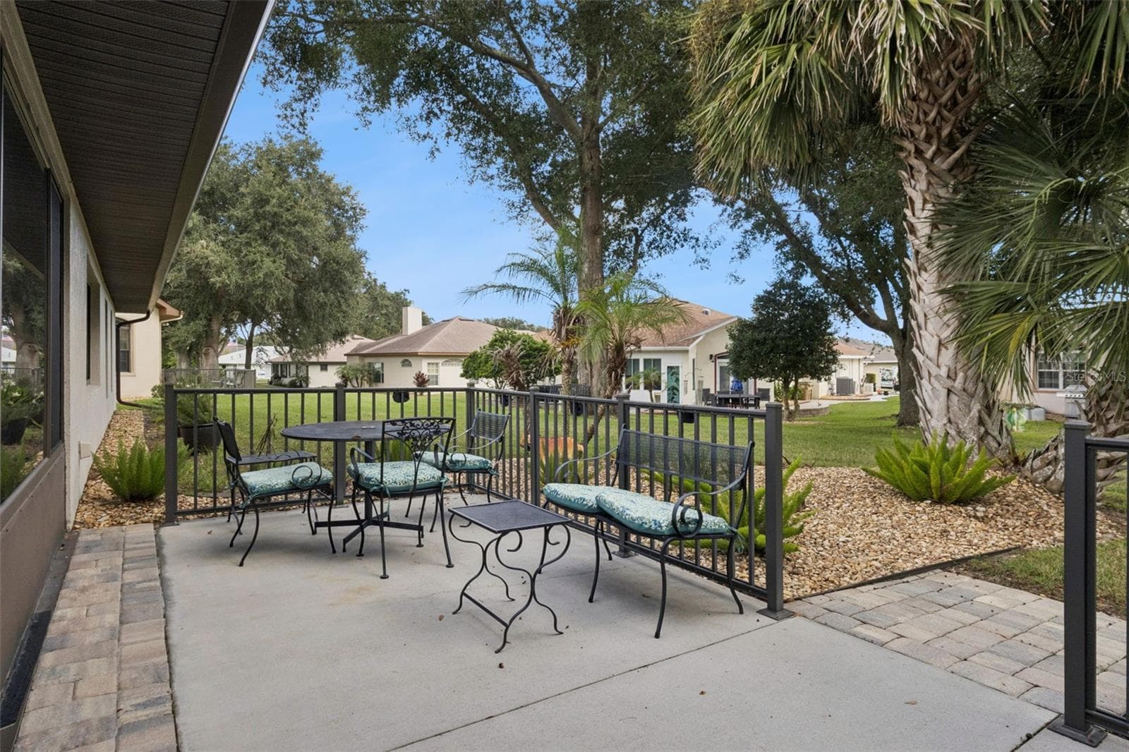 REAR PATIO leads to a BEAUTIFUL PARK-LIKE BACKYARD. - 21736 PRINCESS GRACE CT, LEESBURG