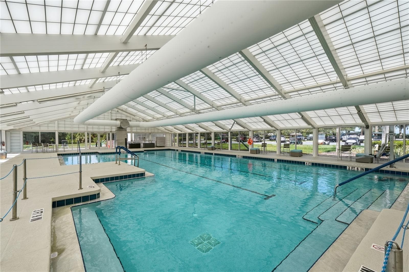 The newly-replaced INDOOR POOL where residents and their guests can SWIM YEAR ‘ROUND in the HEATED pool. - 21736 PRINCESS GRACE CT, LEESBURG