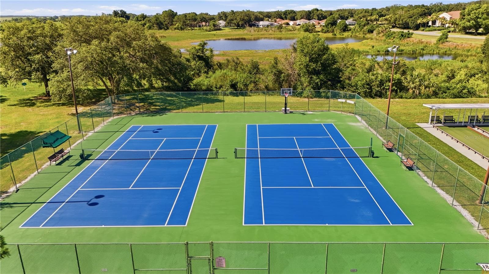 There are four (4) TENNIS COURTS. - 21736 PRINCESS GRACE CT, LEESBURG