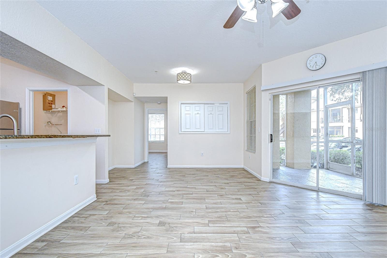 Seamless connection between the great room and lanai expands the living space. - 5125 PALM SPRINGS BLVD #3104, TAMPA