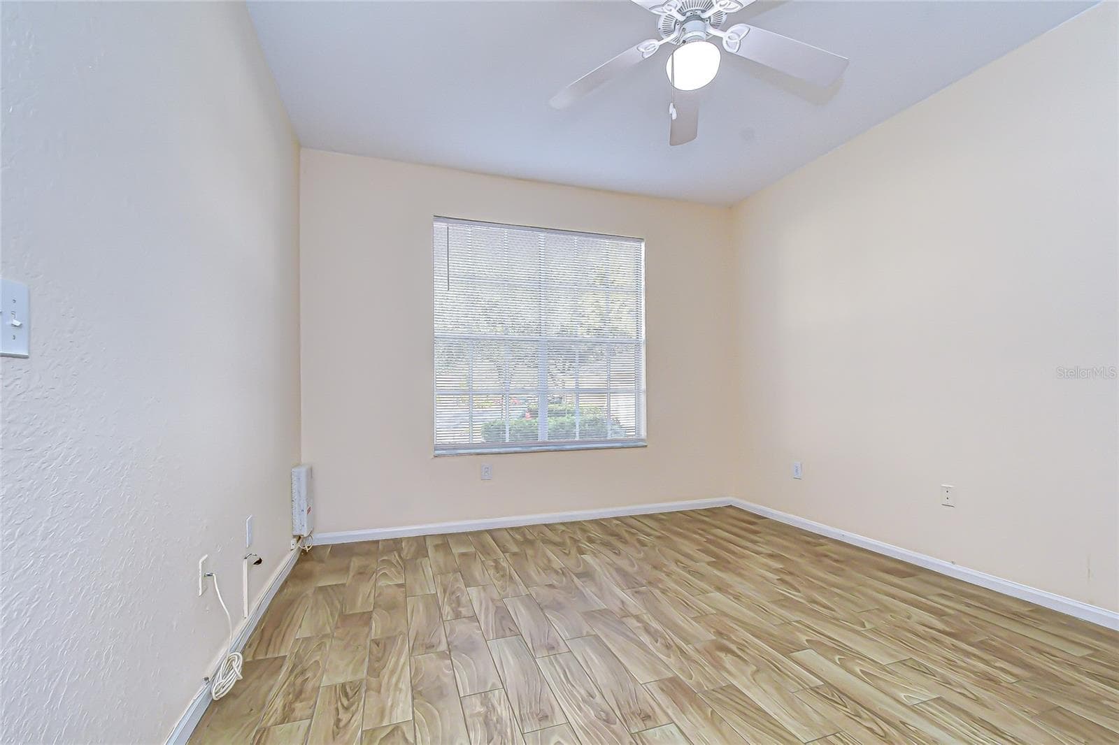 Generously sized primary suite offers a comfortable private retreat. - 5125 PALM SPRINGS BLVD #3104, TAMPA