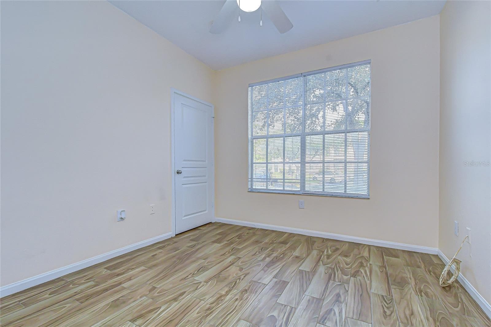 Third bedroom provides comfortable space for overnight guests. - 5125 PALM SPRINGS BLVD #3104, TAMPA
