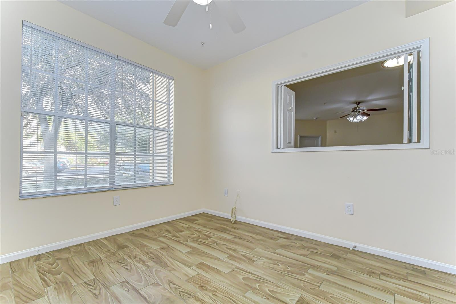 Flexible room can easily serve as a dedicated workspace. - 5125 PALM SPRINGS BLVD #3104, TAMPA