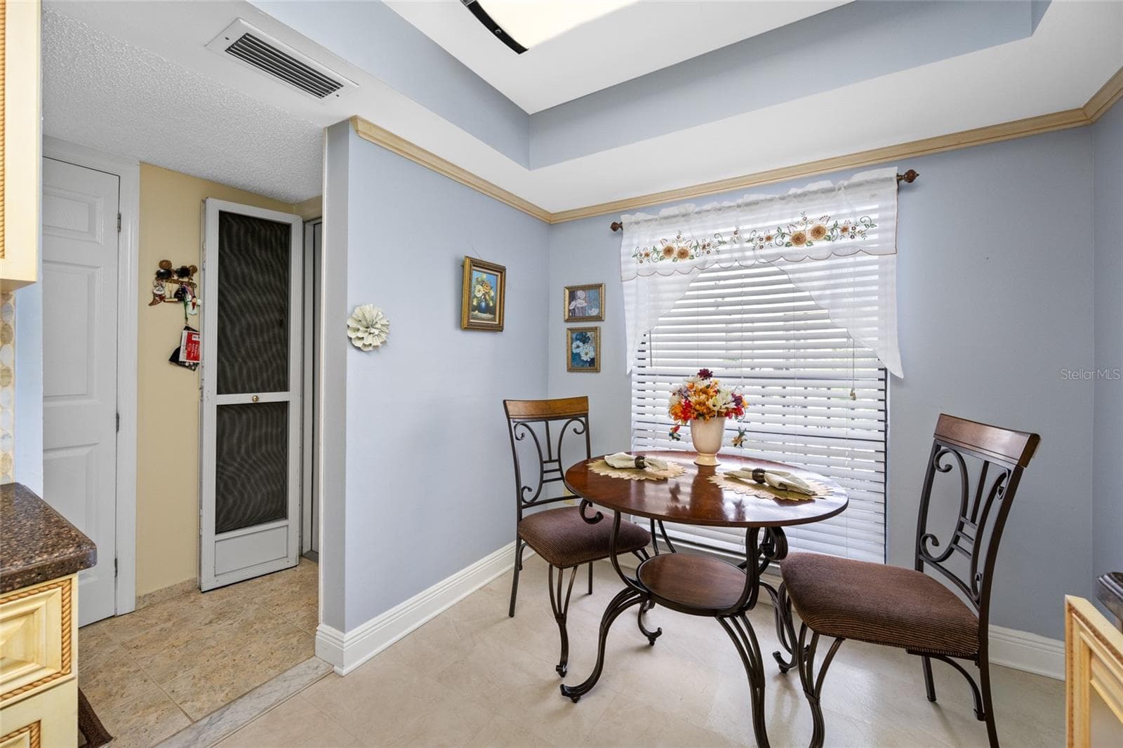 Kitchen located off foyer entry - 2700 COVE CAY DR #1-3B, CLEARWATER