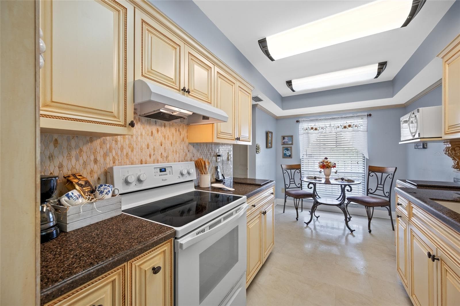 Kitchen is light and bright. - 2700 COVE CAY DR #1-3B, CLEARWATER