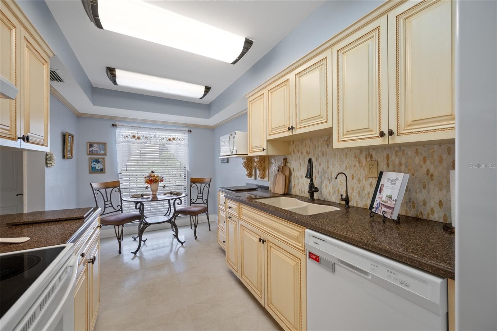 Kitchen with plenty of cabinet space - 2700 COVE CAY DR #1-3B, CLEARWATER