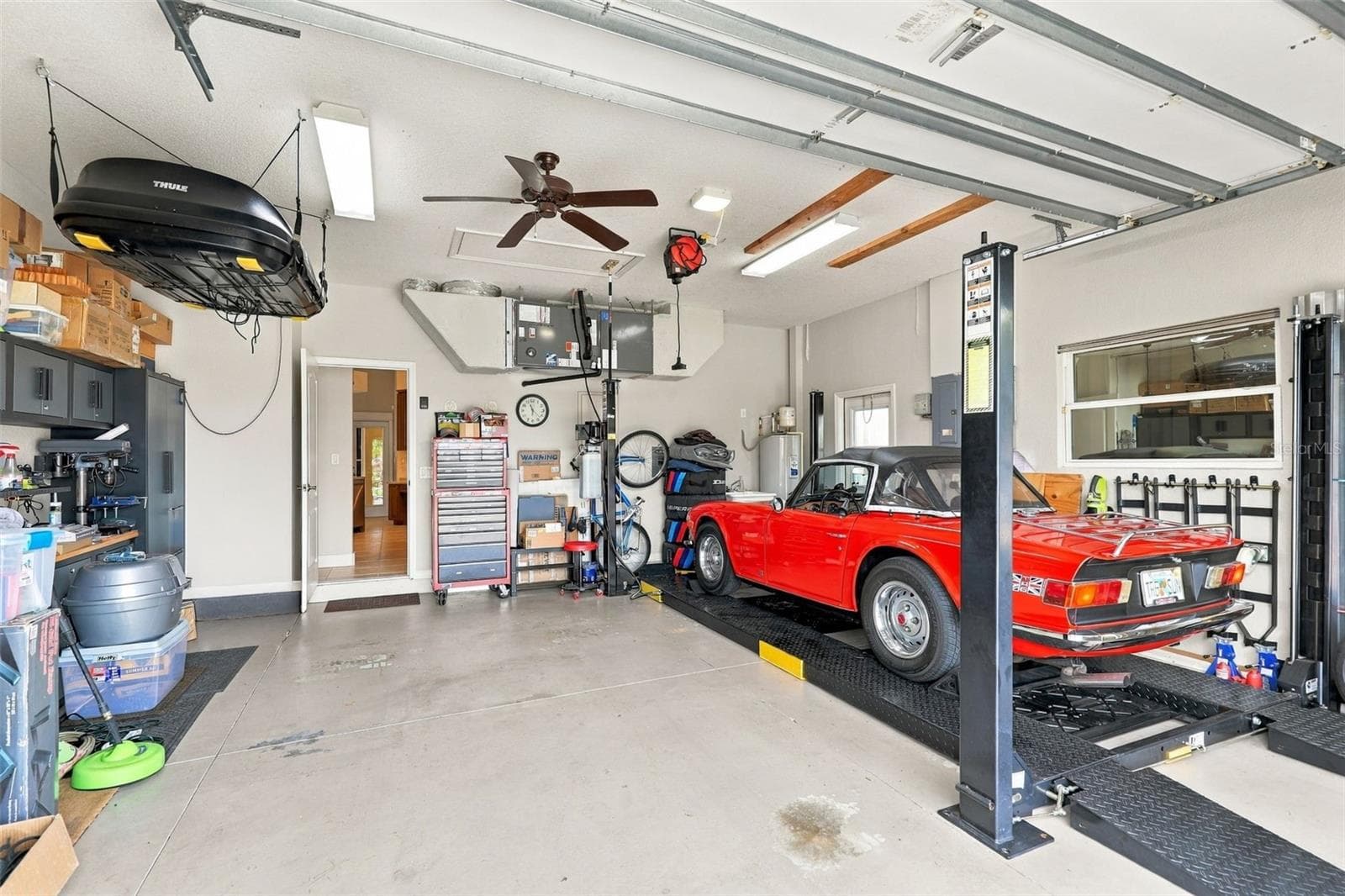 Car Lift is negotiable - 1107 RUM CAY CT, PUNTA GORDA