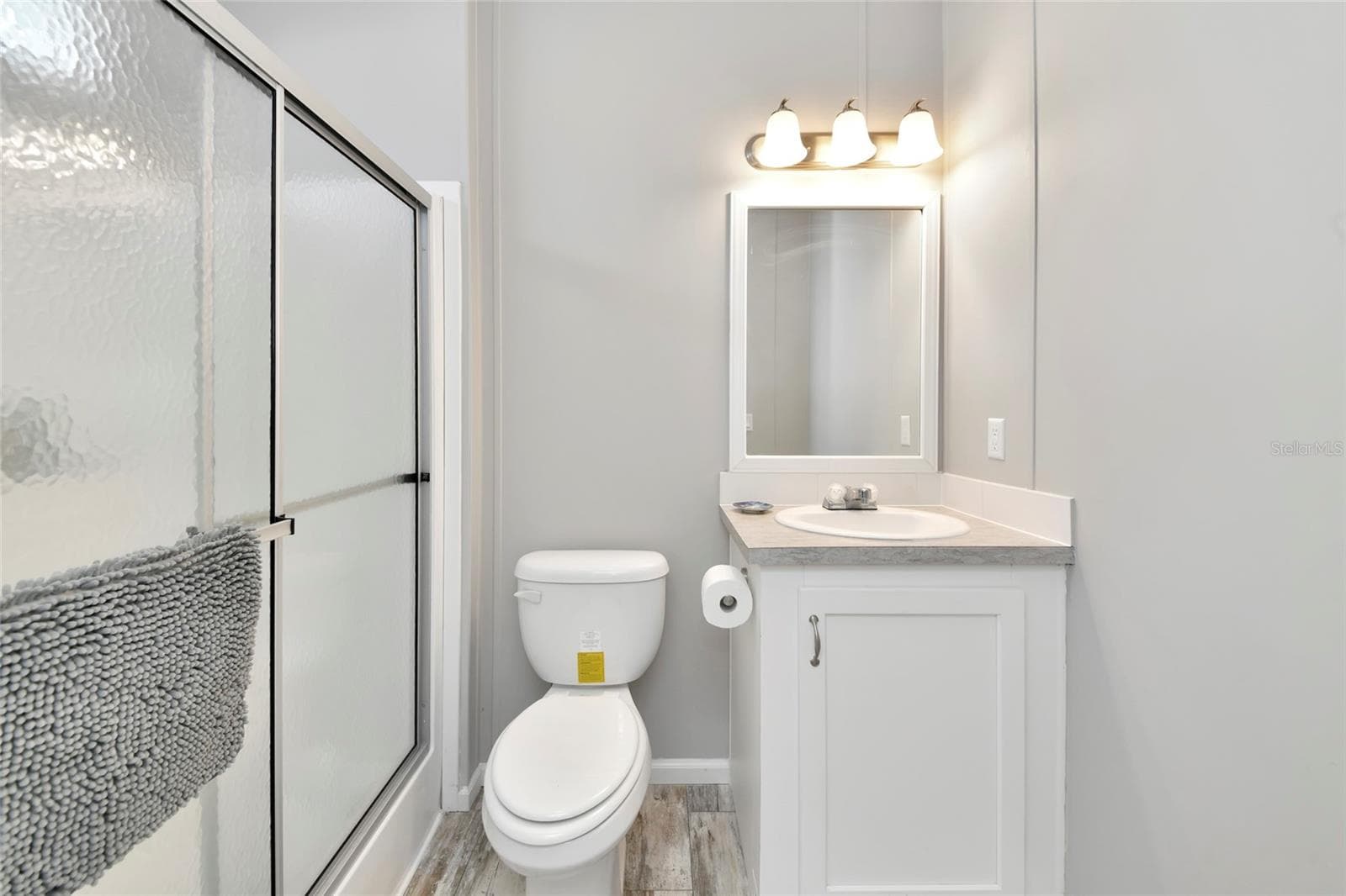 Primary en-suite bathroom with walk-in shower - 6843 HIKINA DR, NORTH PORT