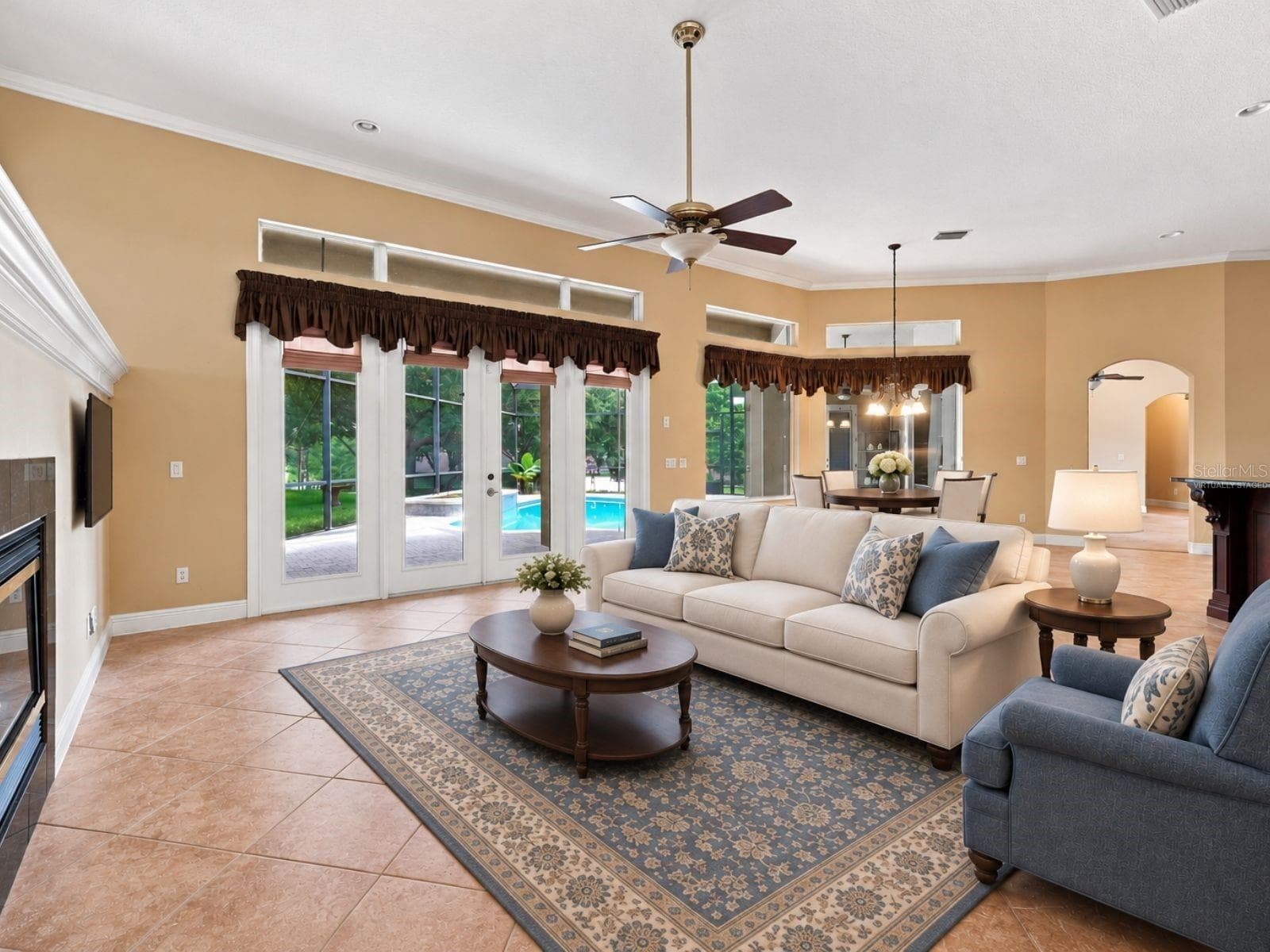 Virtually Staged Family Room-Dinette Lanai - 17535 COBBLESTONE LN, CLERMONT