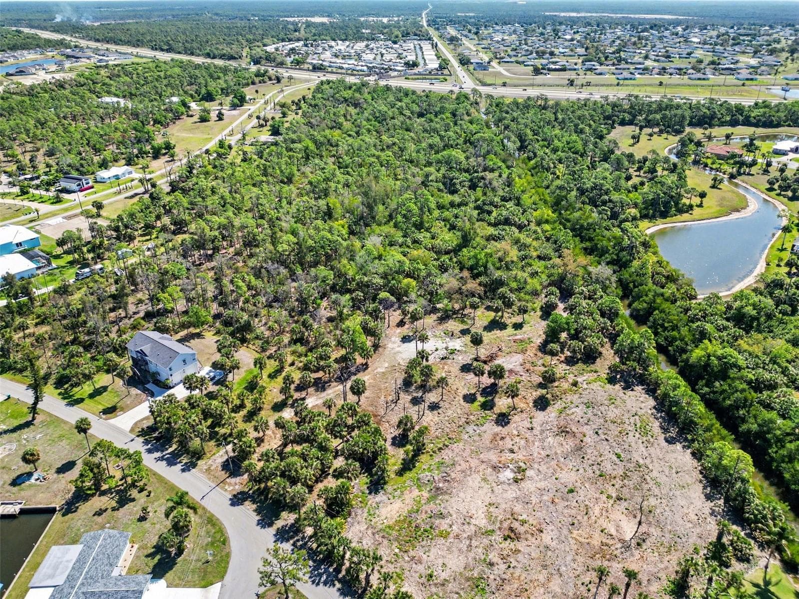 Land at 24383 JEAN LA FITTE BLVD, PUNTA GORDA, photo 9 of 17