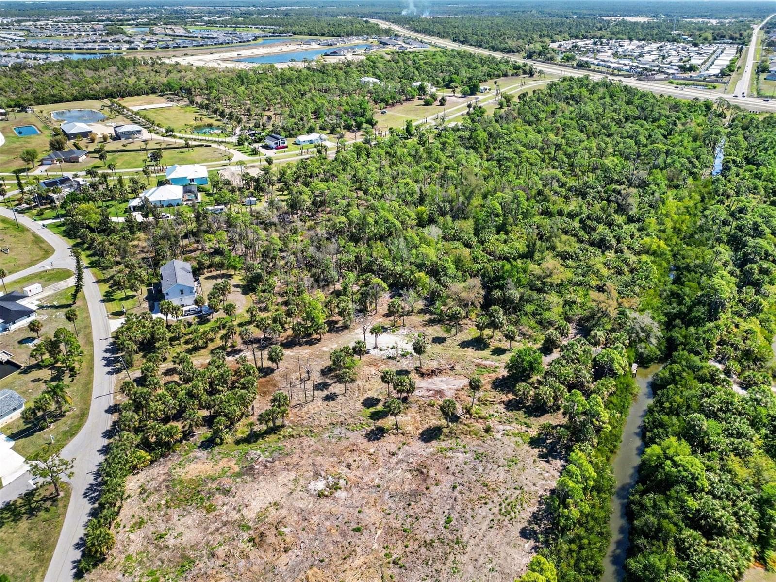 Land at 24383 JEAN LA FITTE BLVD, PUNTA GORDA, photo 10 of 17