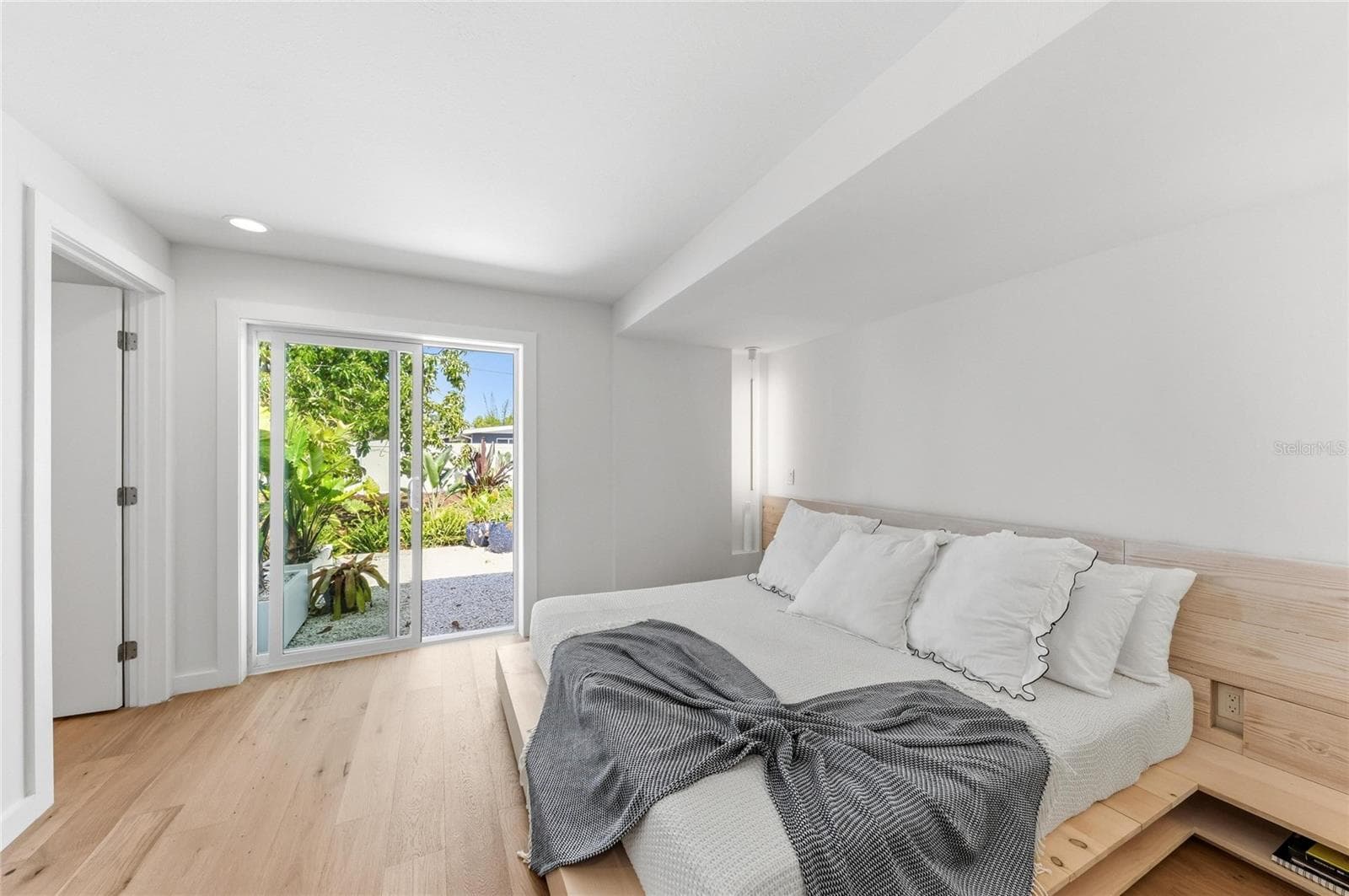 The Master Bedroom with en-suite bath and direct access to the garden. - 2513 CROTON AVE, SARASOTA