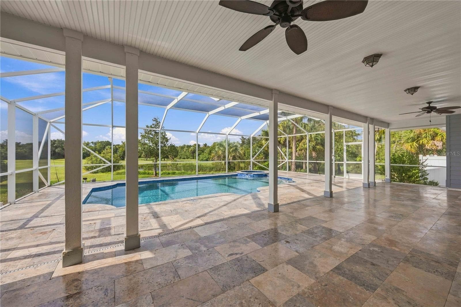 Beautiful travertine tile installed in 2024 - 8543 SW AVIARY RD, ARCADIA