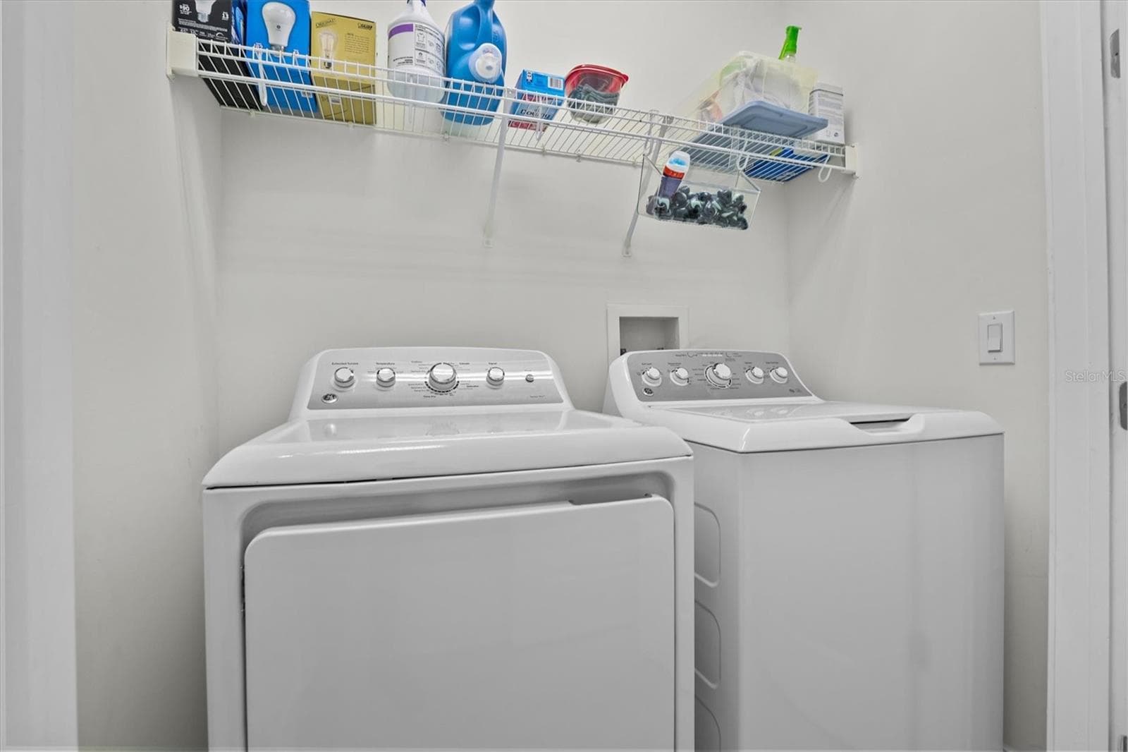 laundry room adjacent to kitchen and owner'ss suite. - 480 GILMAN PL N, ST PETERSBURG