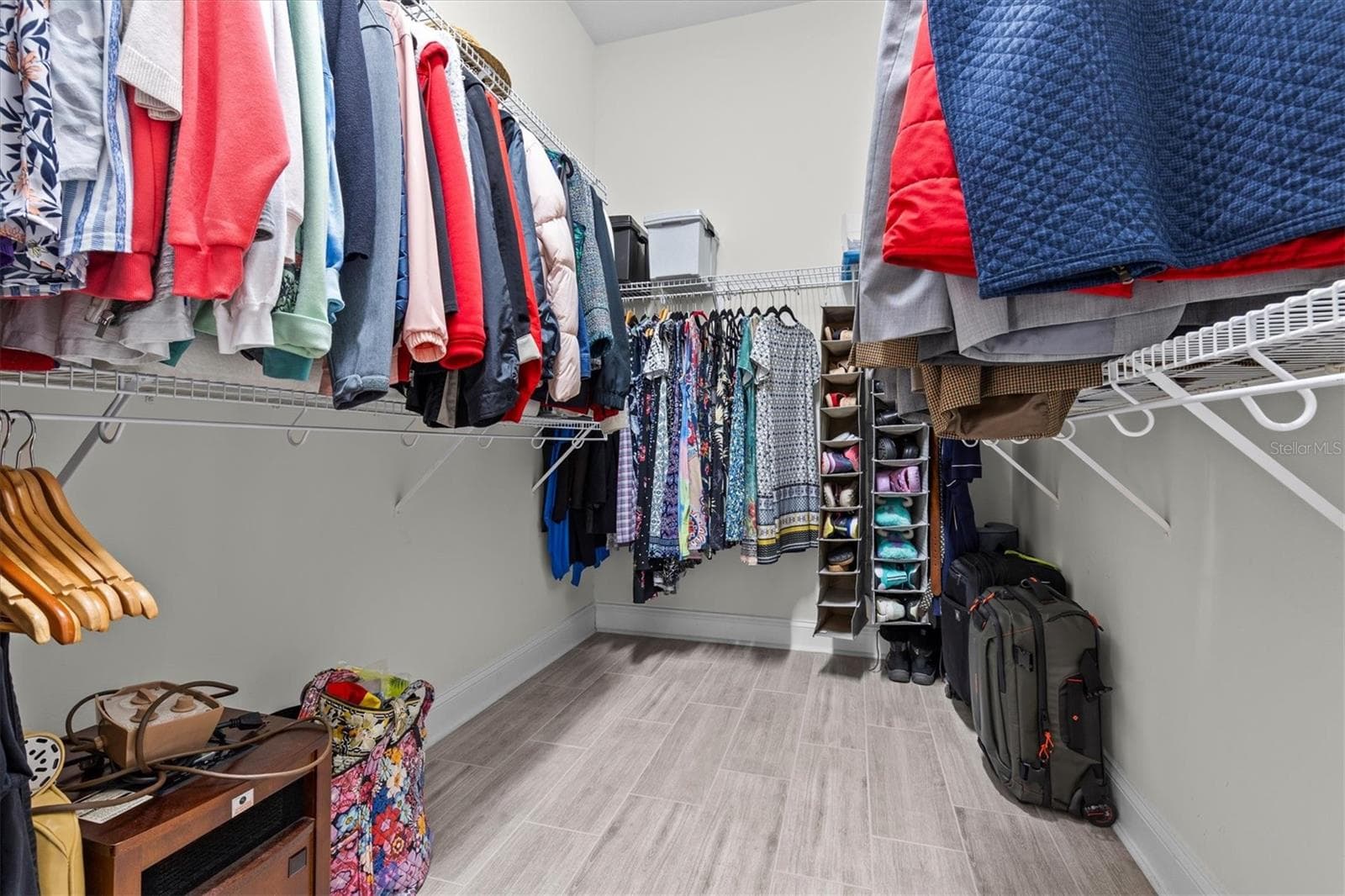 One of two large walk-in closets in Owner's suite. - 480 GILMAN PL N, ST PETERSBURG