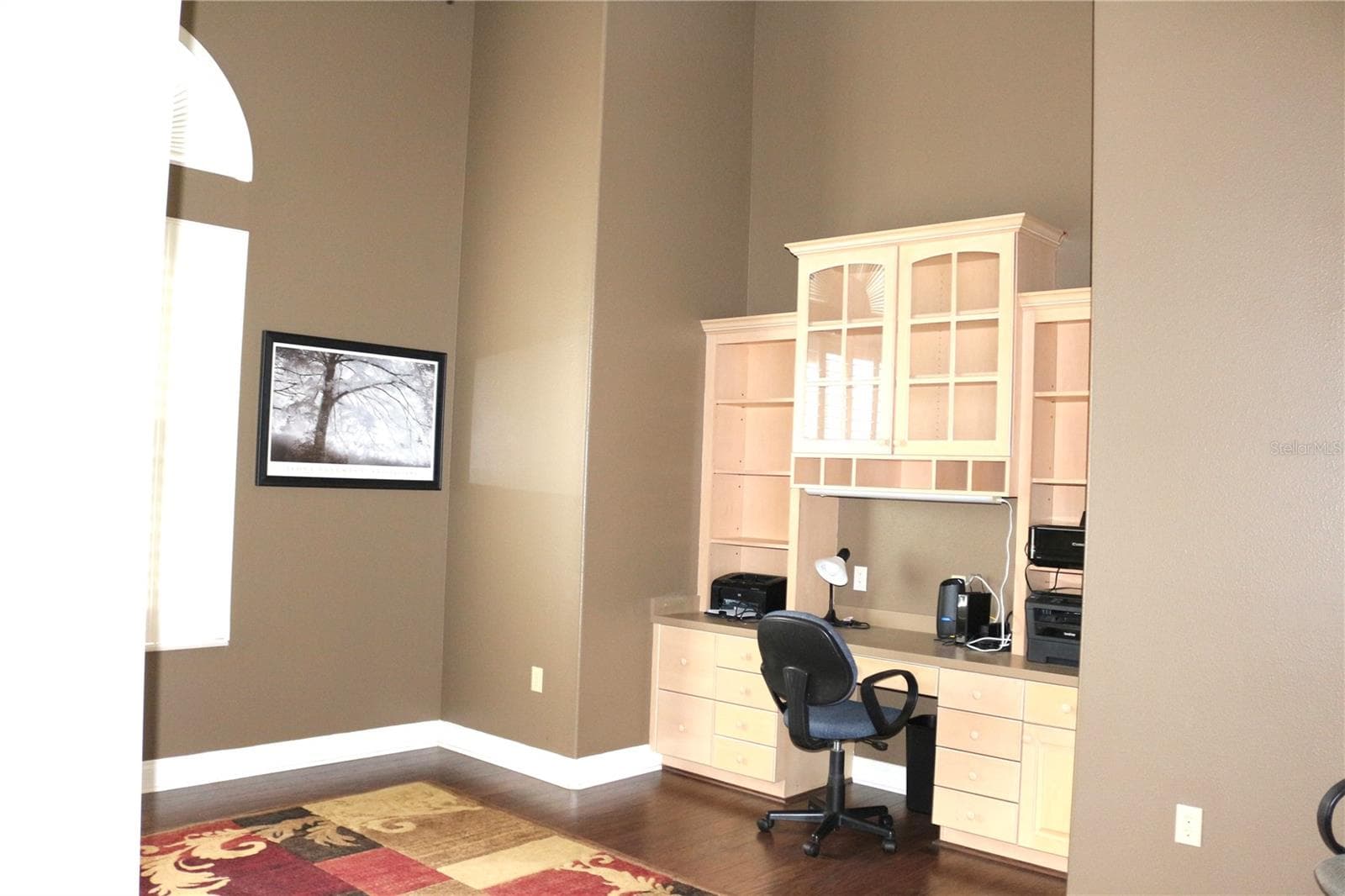 Beautiful built ins in the office area provides attractive display and storage and work space. - 6722 W SENTINEL BLUFF PATH, BEVERLY HILLS