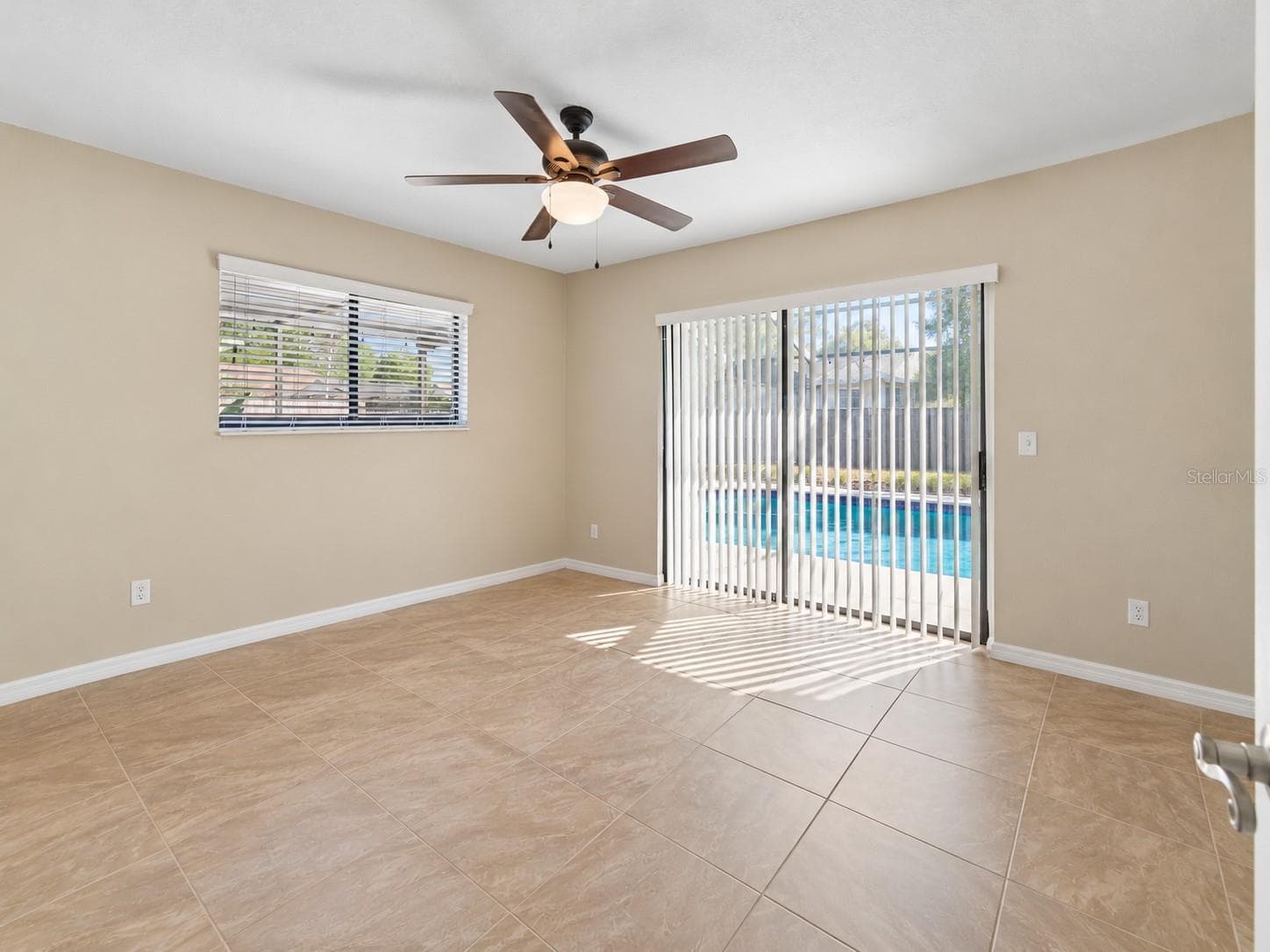 Bedroom 3 - Pool access*this is an AI generated photo - 8930 BROOKER DR, NEW PORT RICHEY