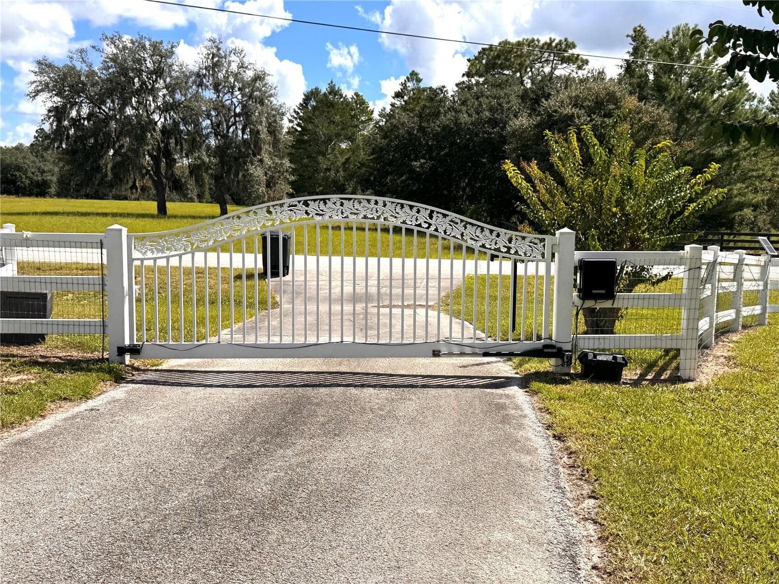 Gated entrance welcomes you to this private 10 acre equestrian estate - 6722 W SENTINEL BLUFF PATH, BEVERLY HILLS