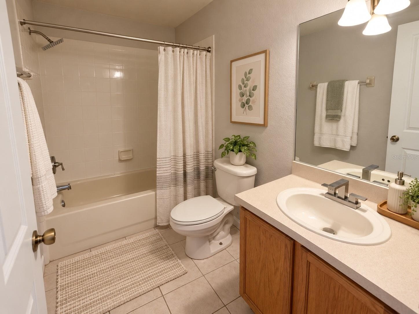 2nd bathroom virtual staging - 4996 TOWN TER N, KISSIMMEE