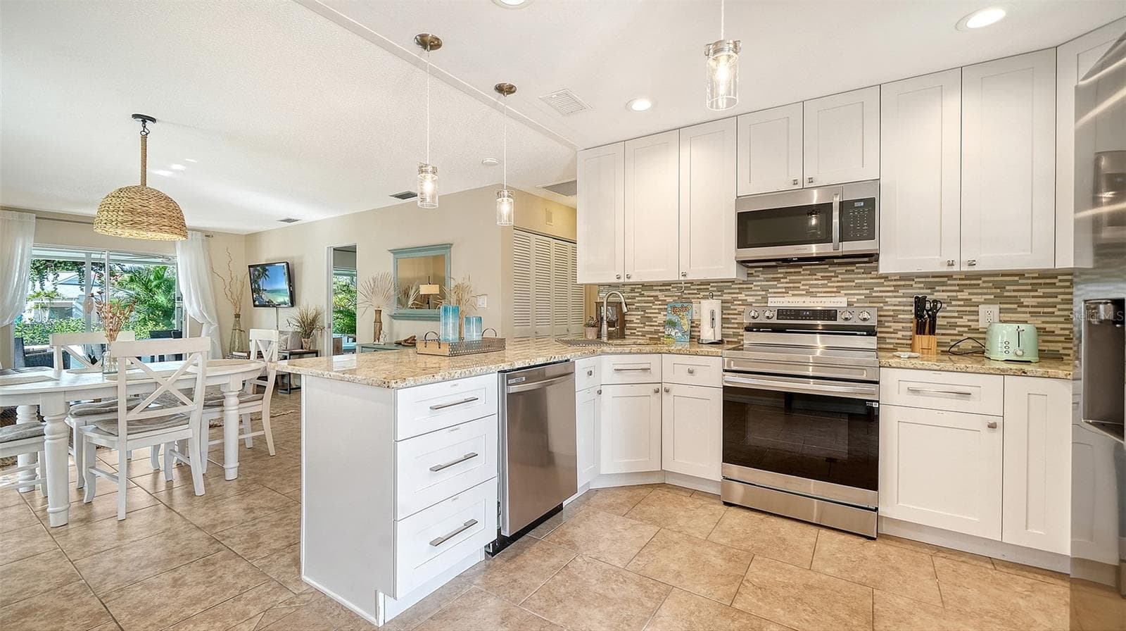 Front Entry into Kitchen - 1229 MOONMIST CIR #P6, SARASOTA