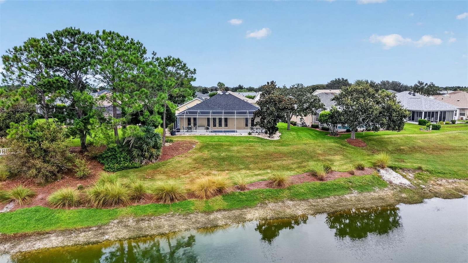 Aerial Rear Elevation with Waterfront Views - 2334 AMBLER CIR, THE VILLAGES