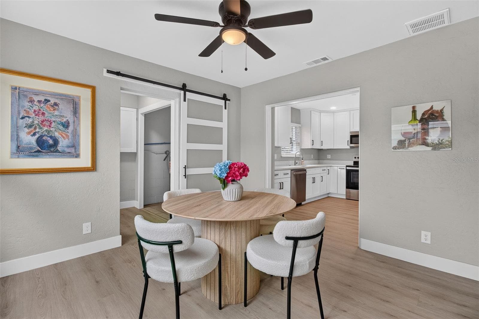 DINING ROOM WITH NEW CEILING FAN - 2109 58TH ST S, GULFPORT