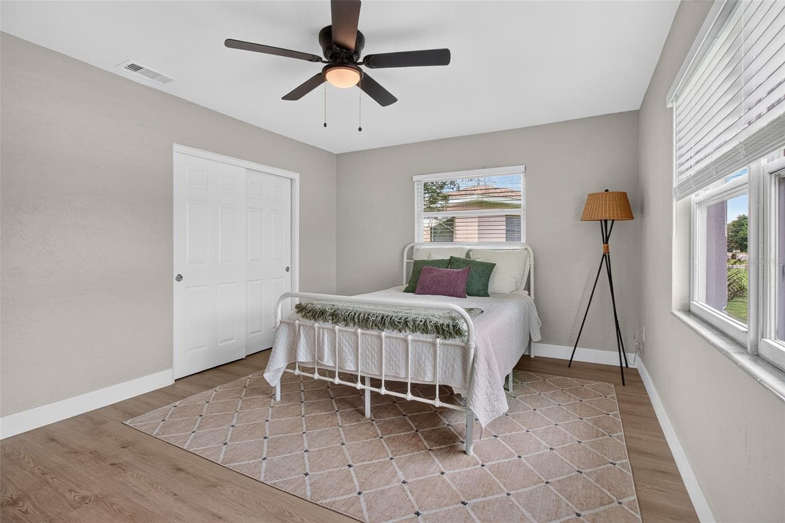 GOOD SIZED PRIMARY BEDROOM WITH BUILT IN CLOSET AND NEW CEILING FAN - 2109 58TH ST S, GULFPORT